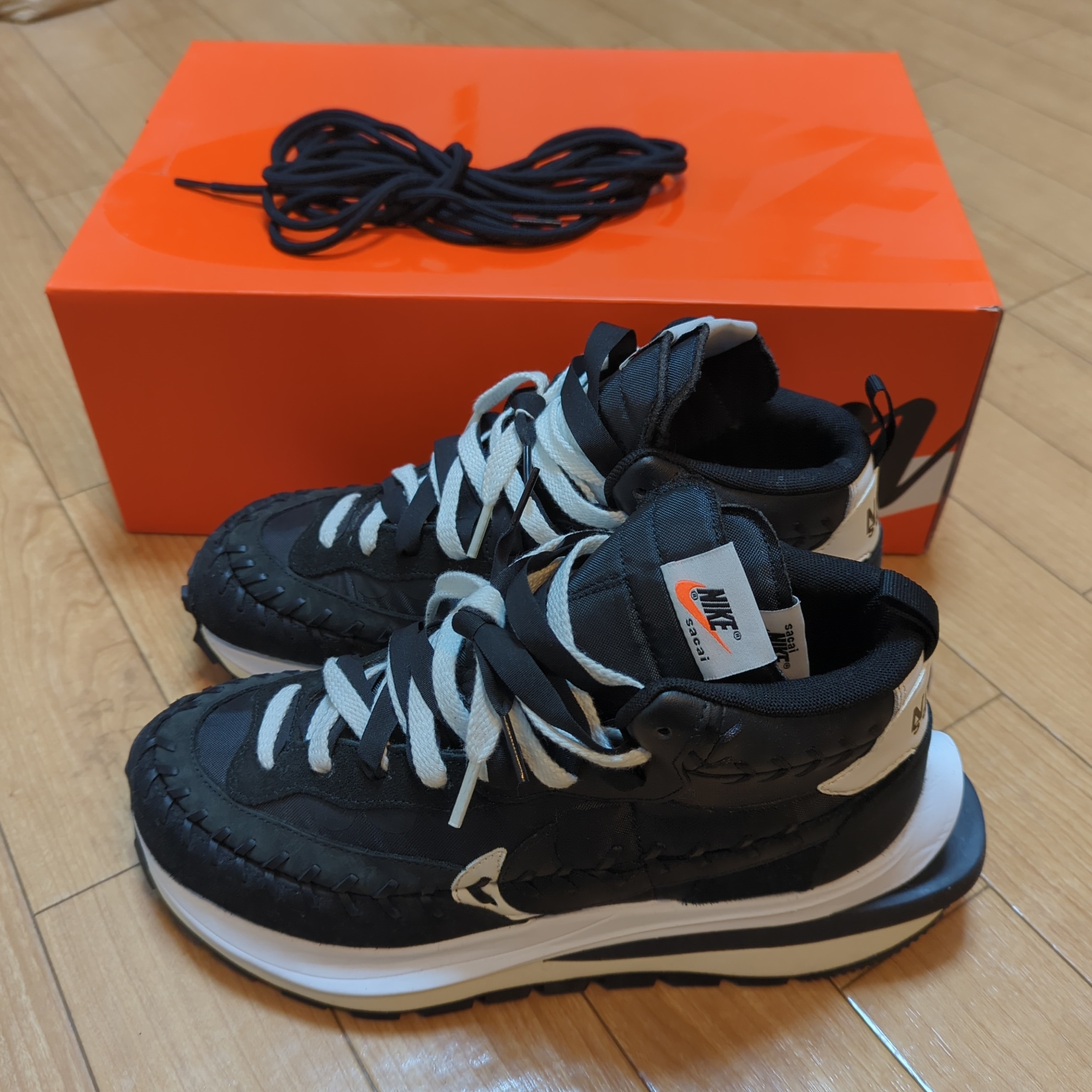 Jean-Paul Gaultier × sacai × Nike Vapor Waffle "Black/Black-White"