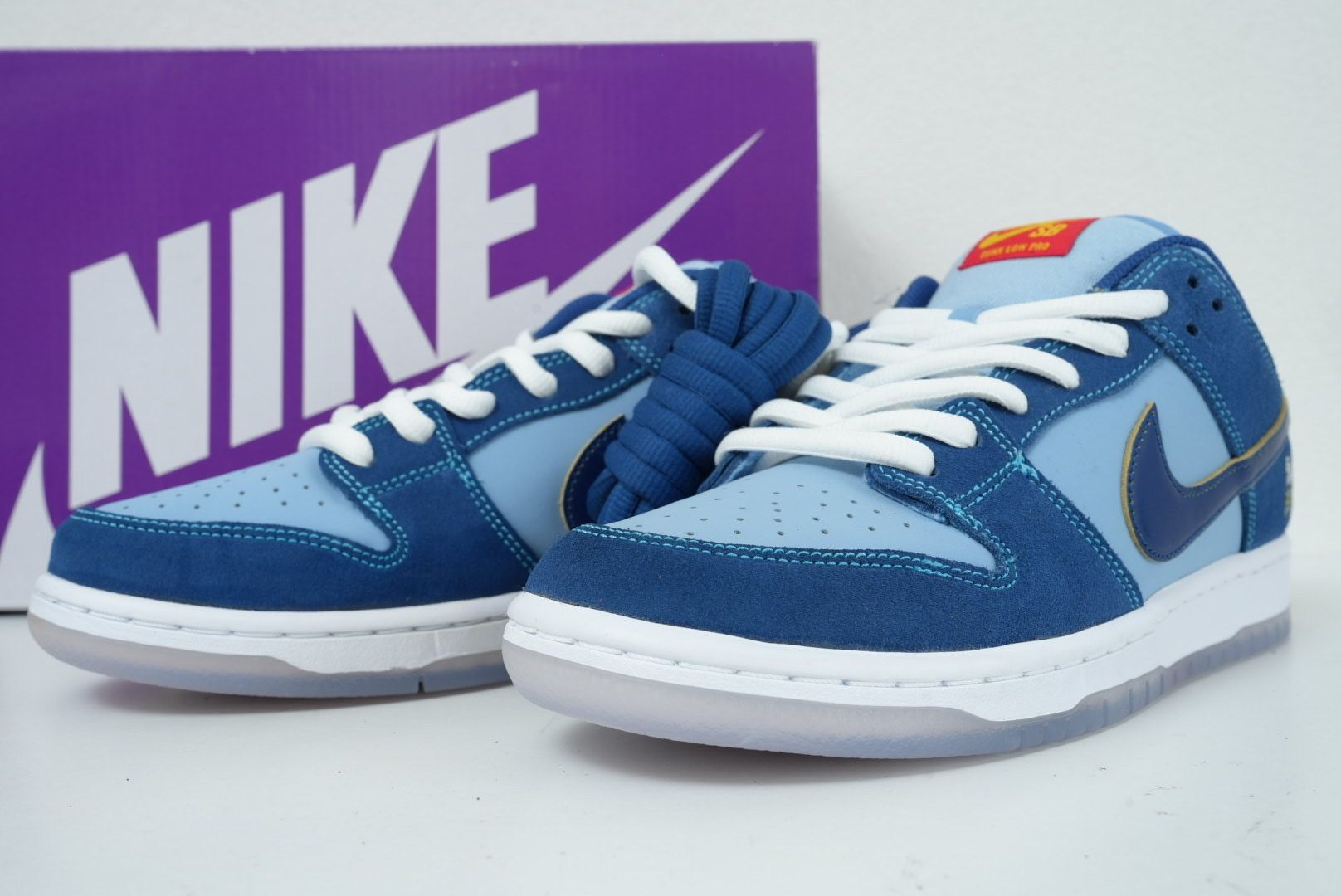 Why So Sad? × Nike SB Dunk Low "Coastal Blue/Speed Yellow-University Red"