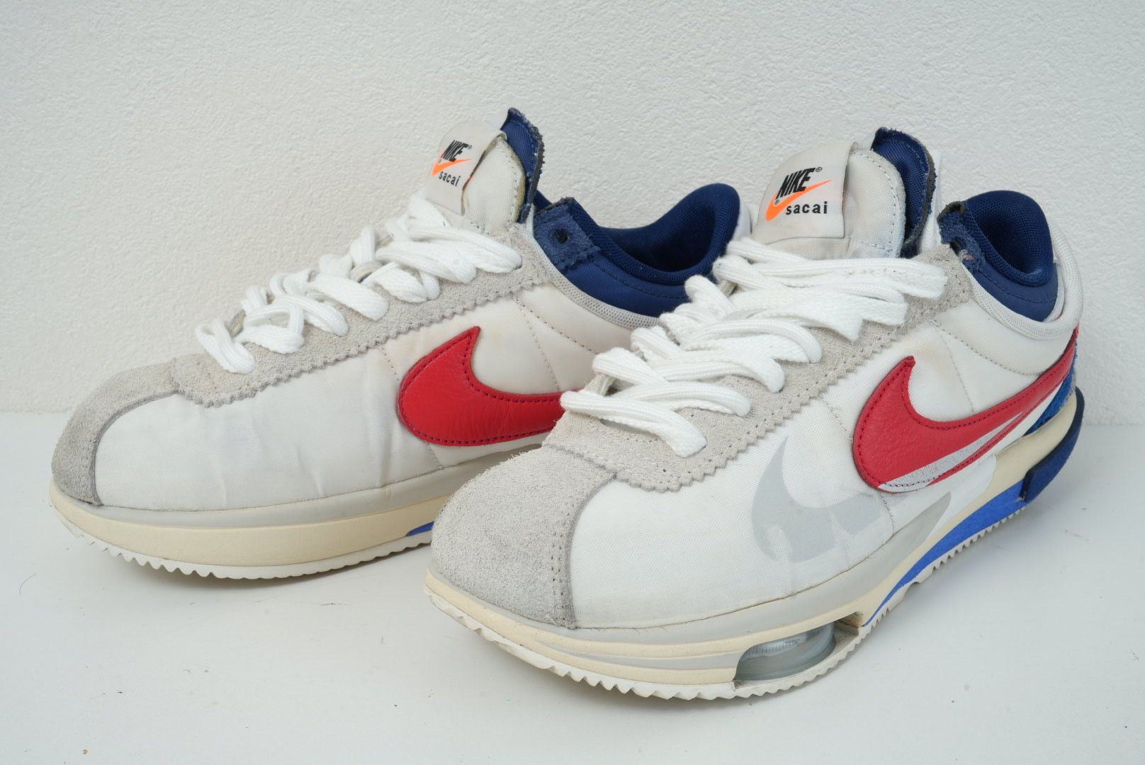 sacai × Nike Zoom Cortez "White and University Red"