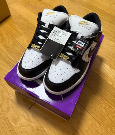 Supreme × Nike SB Dunk Low OG QS Gold Stars "White/Black"