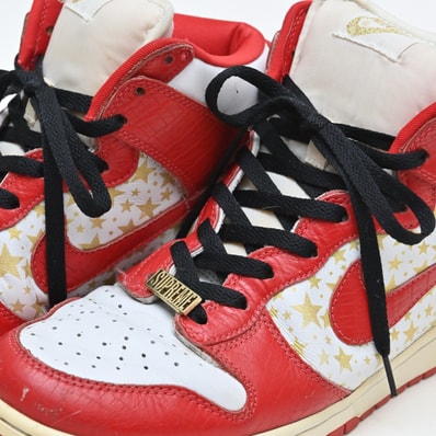Supreme × Nike SB Dunk High "Red Stars"