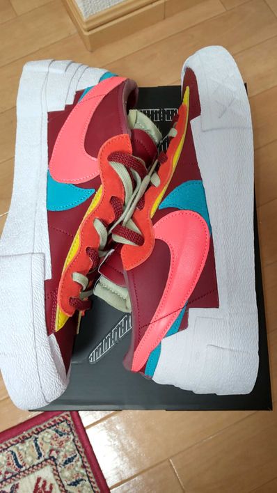 KAWS × sacai × Nike Blazer Low "Team Red"