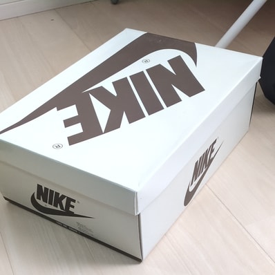 Travis Scott × Nike Air Jordan 1 Low OG SP "Reverse Mocha/Sail and Ridgerock"