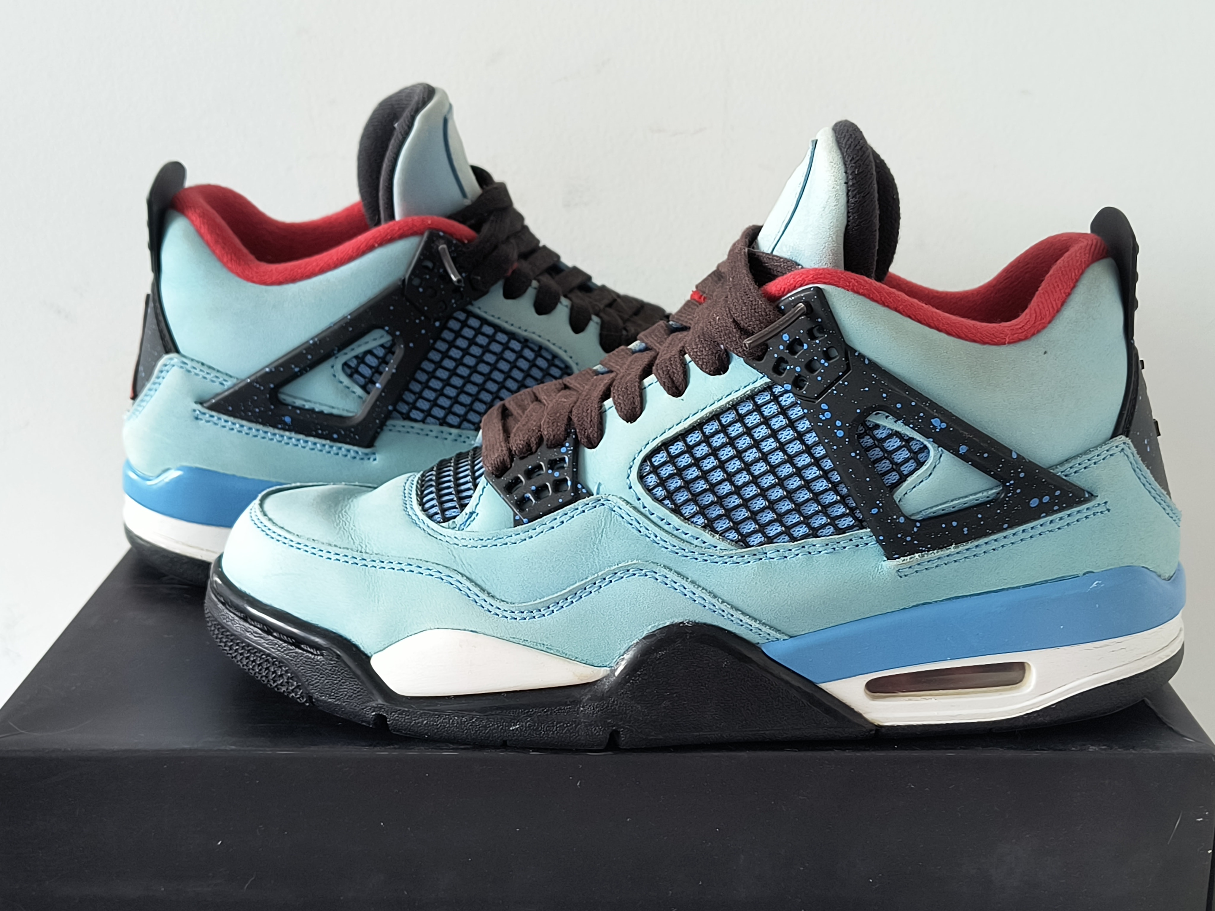 Travis Scott × Nike Air Jordan 4 Retro Cactus Jack "University Blue"