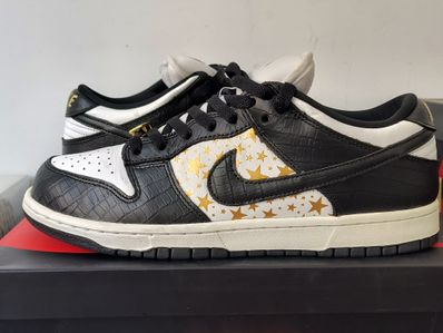 Supreme × Nike SB Dunk Low OG QS Gold Stars "White/Black"