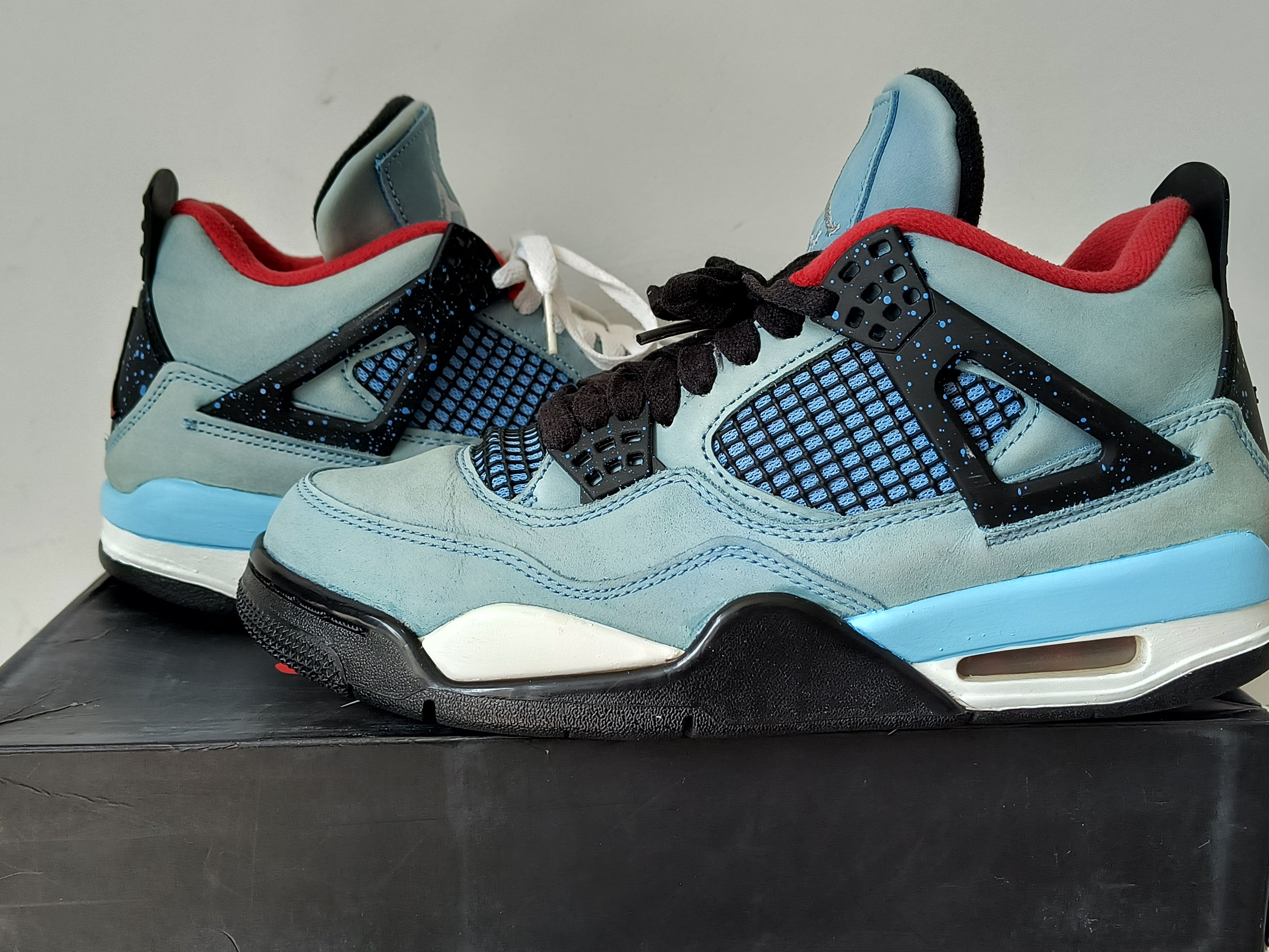 Travis Scott × Nike Air Jordan 4 Retro Cactus Jack "University Blue"