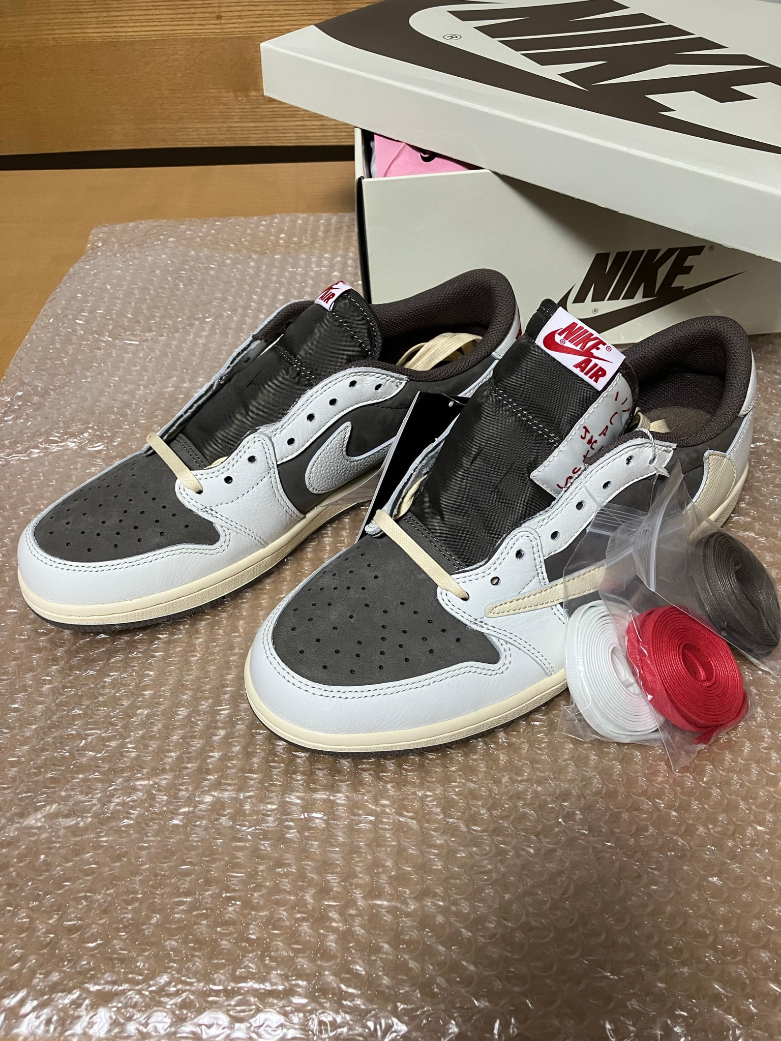 Travis Scott × Nike Air Jordan 1 Low OG SP "Reverse Mocha/Sail and Ridgerock"