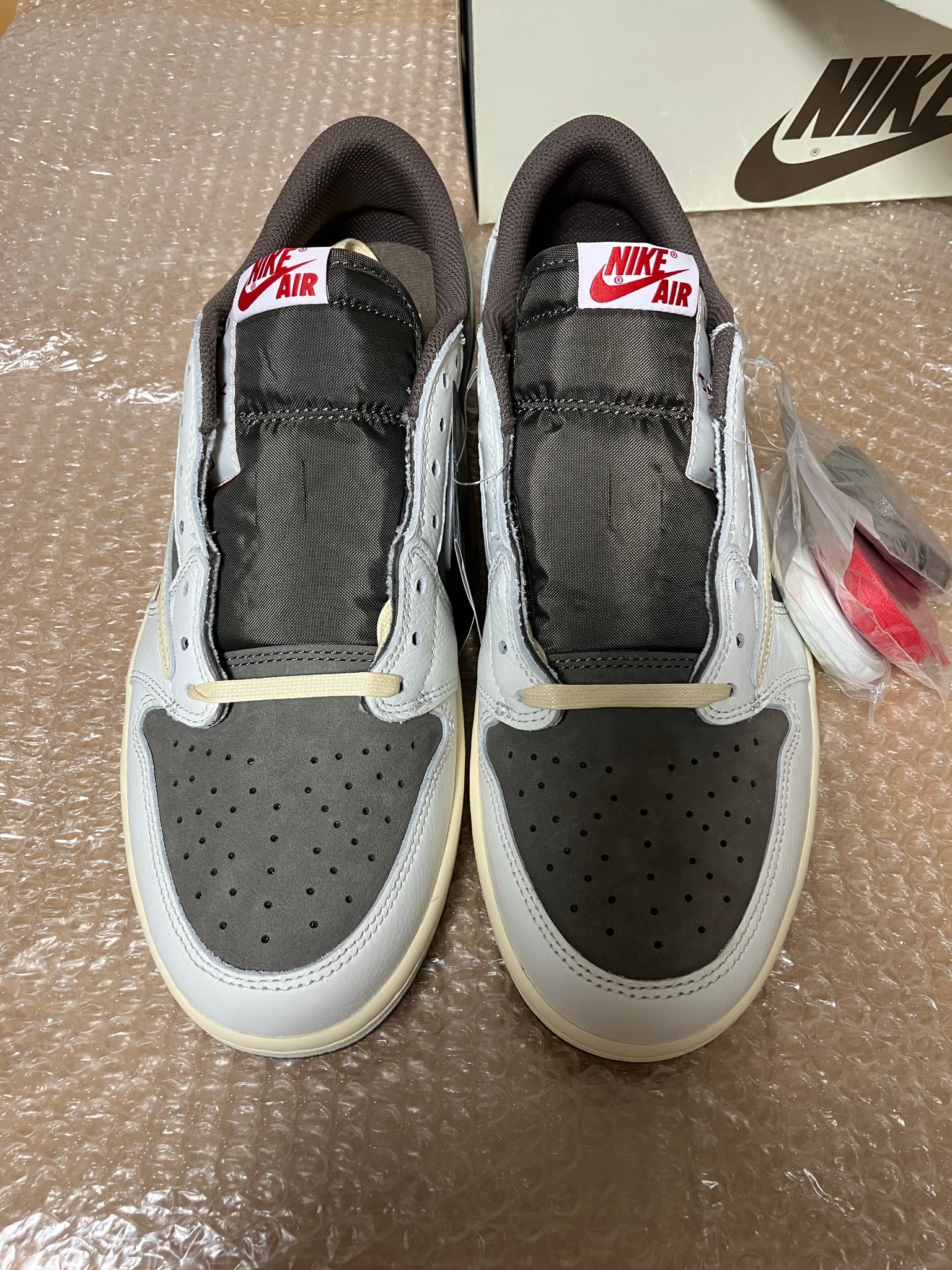 Travis Scott × Nike Air Jordan 1 Low OG SP "Reverse Mocha/Sail and Ridgerock"