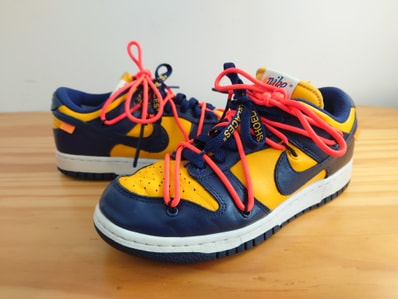 Off-White × Nike Dunk Low LTHR "University Gold/Midnight Navy/White"