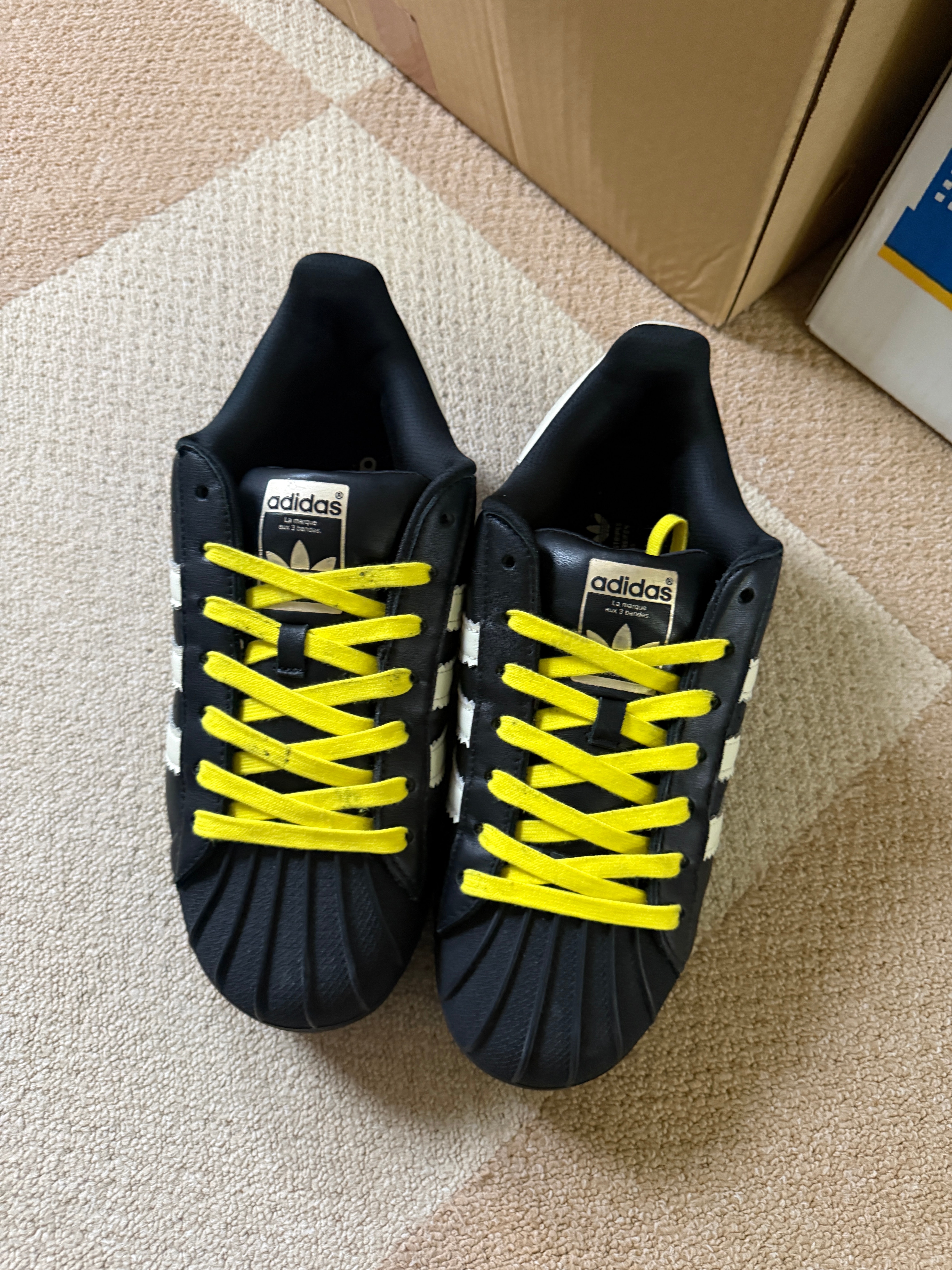 Pharrell Williams × adidas Superstar 92 "Core Black/Sky Rush/Cream White"