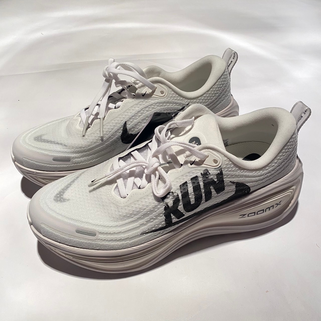 Nike Vomero Plus "Reverse Swoosh"