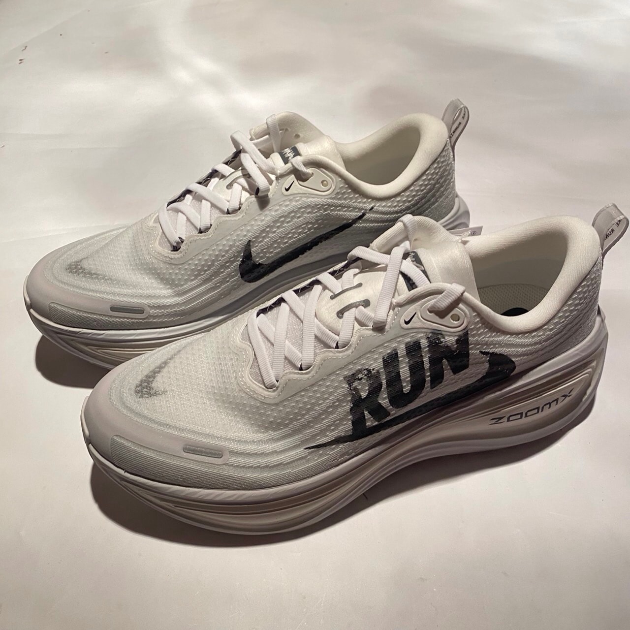 Nike Vomero Plus "Reverse Swoosh"