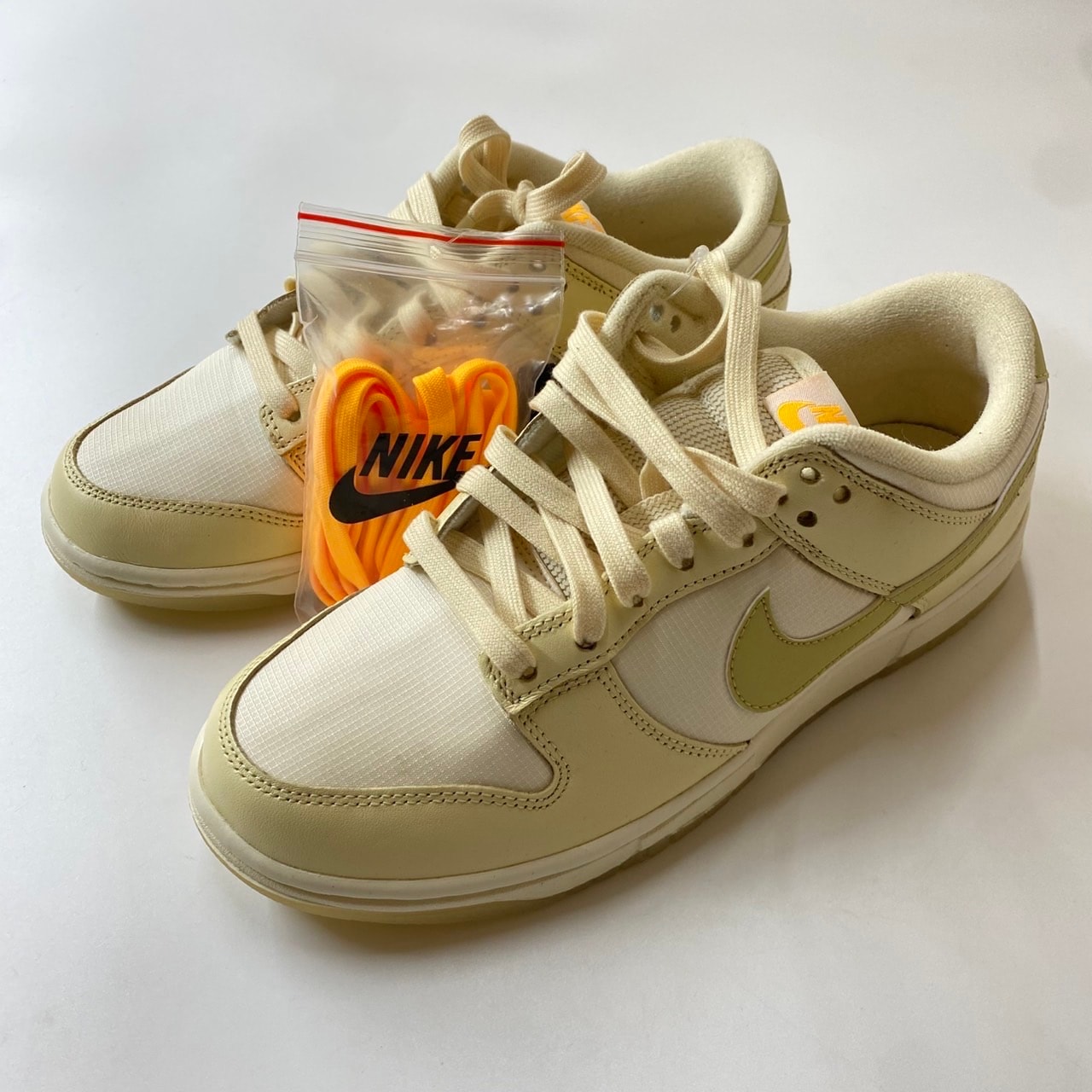 Nike Women's Dunk Low "Muslin/Pale Ivory/Laser Orange/Team Gold"