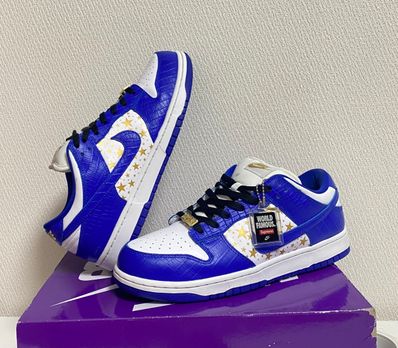 Supreme × Nike SB Dunk Low OG QS Gold Stars "White/Hyper Blue"