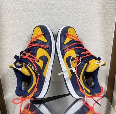 Off-White × Nike Dunk Low LTHR "University Gold/Midnight Navy/White"