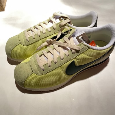 Nike Cortez TXT "Light Lemon Twist/Black/Coconut Milk/White"