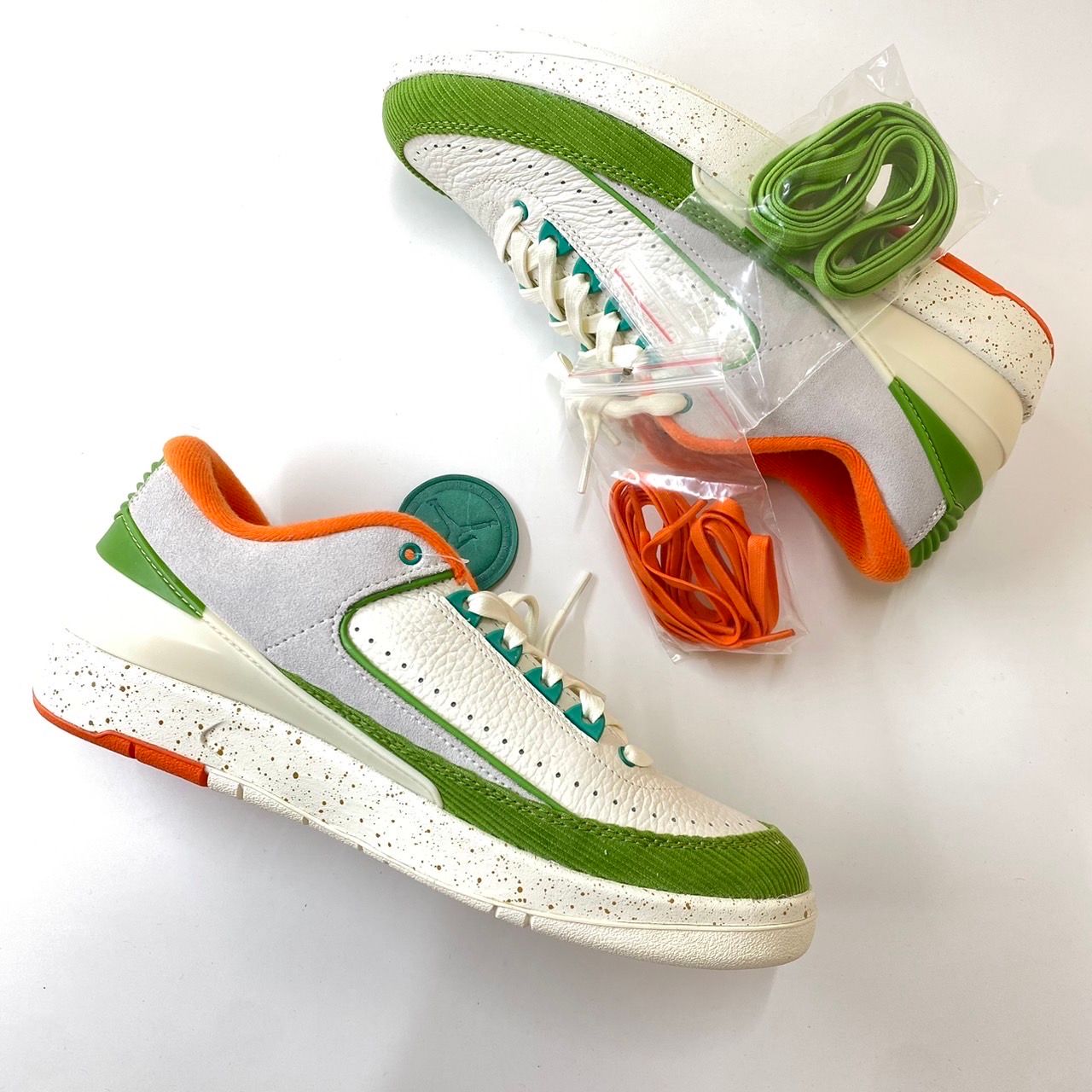 The Titan × Nike Women's Air Jordan 2 Low "Safety Orange/Chlorophyll"