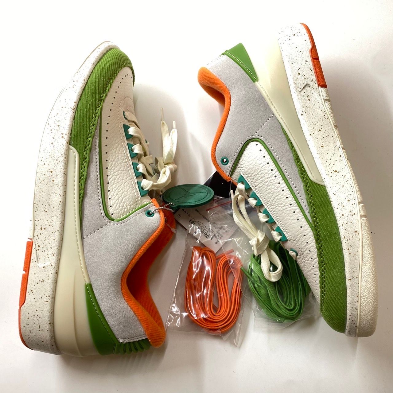 The Titan × Nike Women's Air Jordan 2 Low "Safety Orange/Chlorophyll"