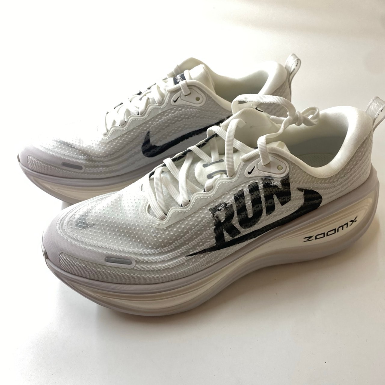 Nike Vomero Plus "Reverse Swoosh"