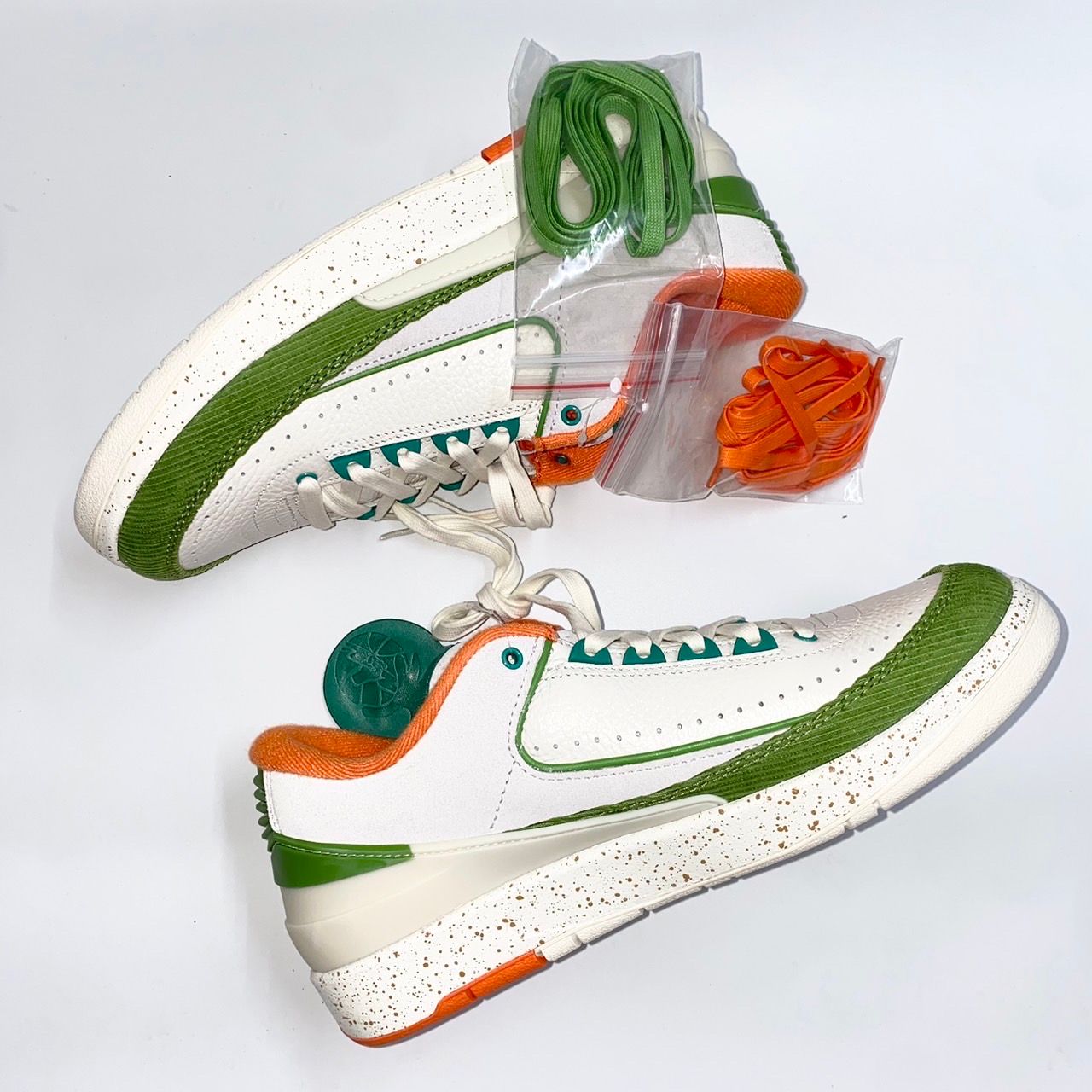 The Titan × Nike Women's Air Jordan 2 Low "Safety Orange/Chlorophyll"