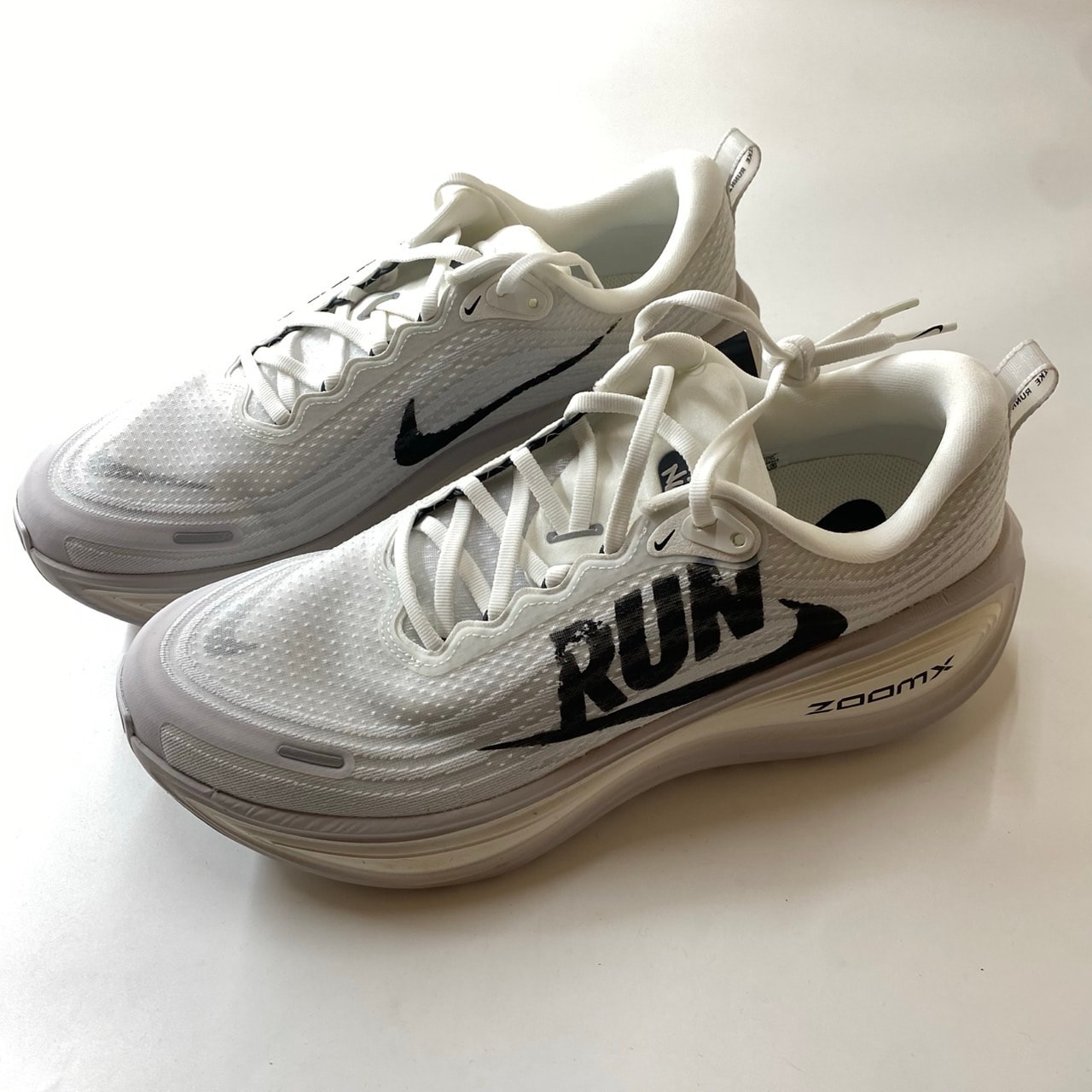 Nike Vomero Plus "Reverse Swoosh"