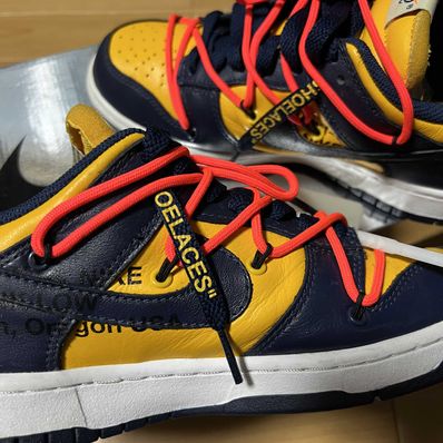Off-White × Nike Dunk Low LTHR "University Gold/Midnight Navy/White"