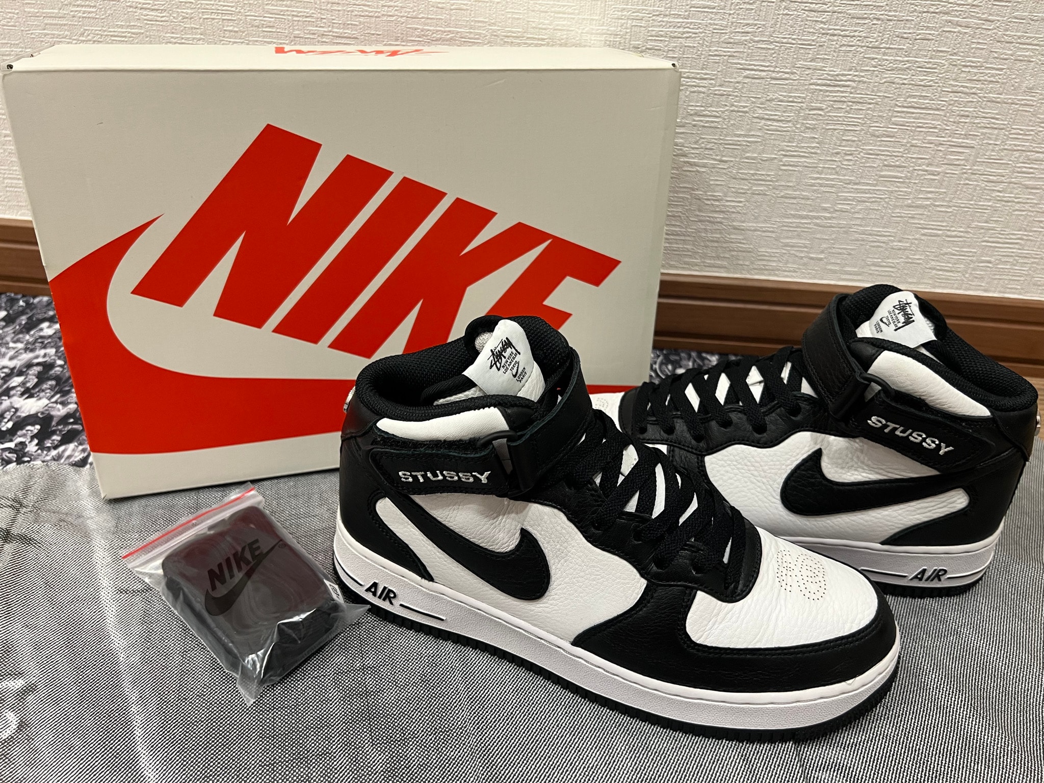 Stussy × Nike Air Force 1 Mid "Black and Light Bone"