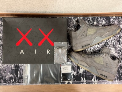 KAWS × Nike Air Jordan 4 Retro "Grey"