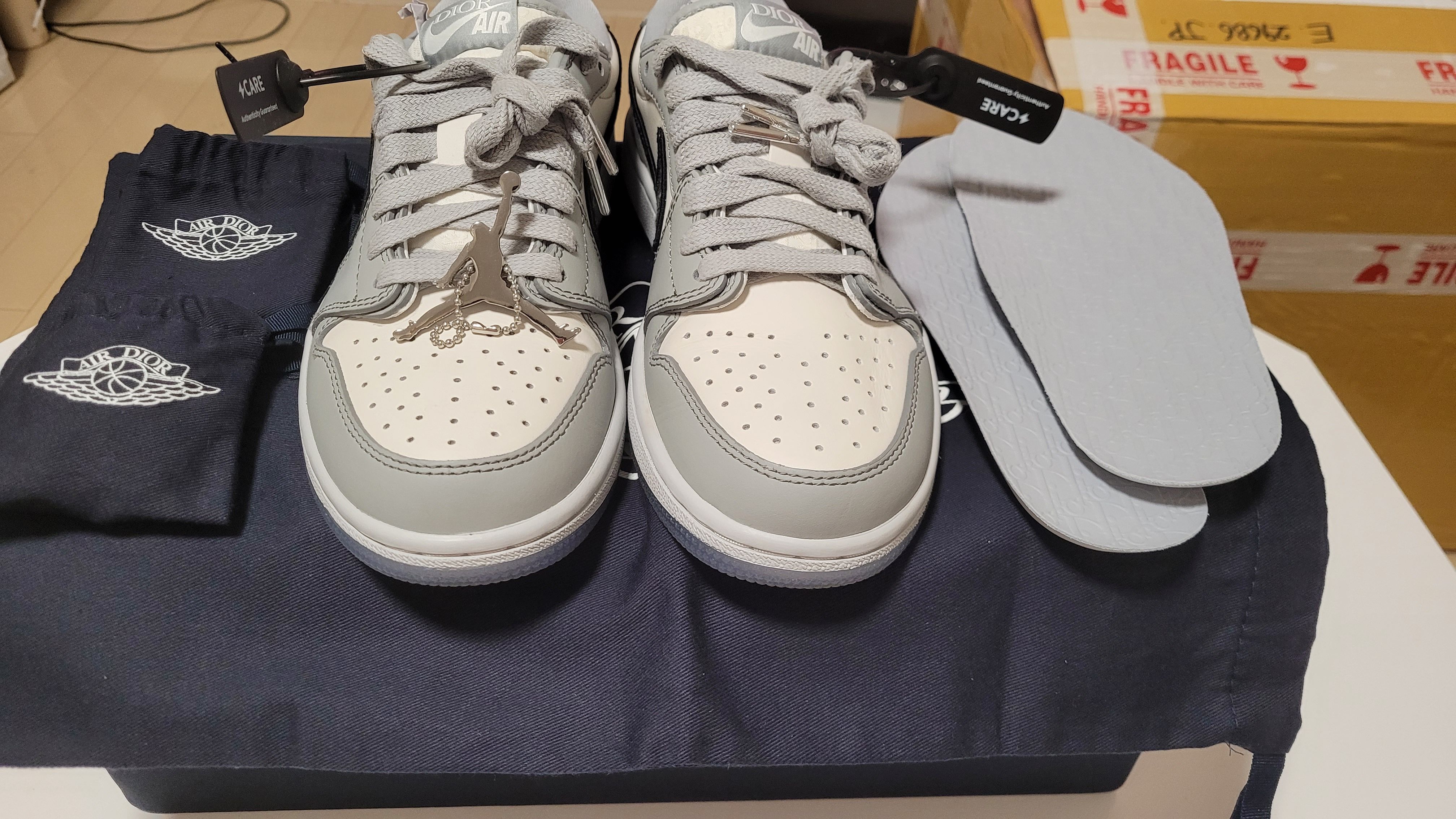 Dior × Nike Air Jordan 1 Low OG "Wolf Grey/Black-Sail-White"