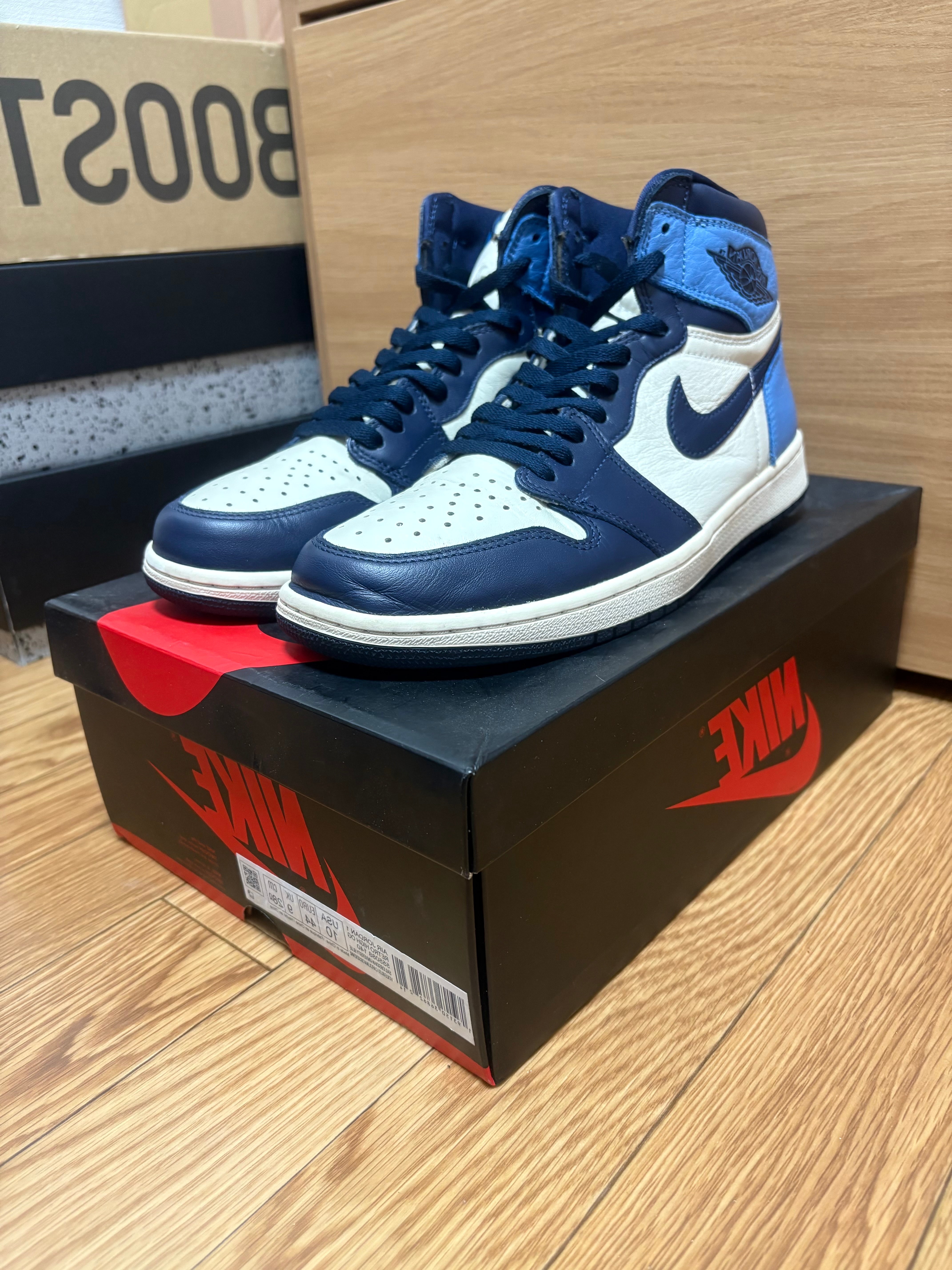 ナイキ エアジョーダン1 レトロ ハイ OG "オブシディアン/ユニバーシティ ブルー"