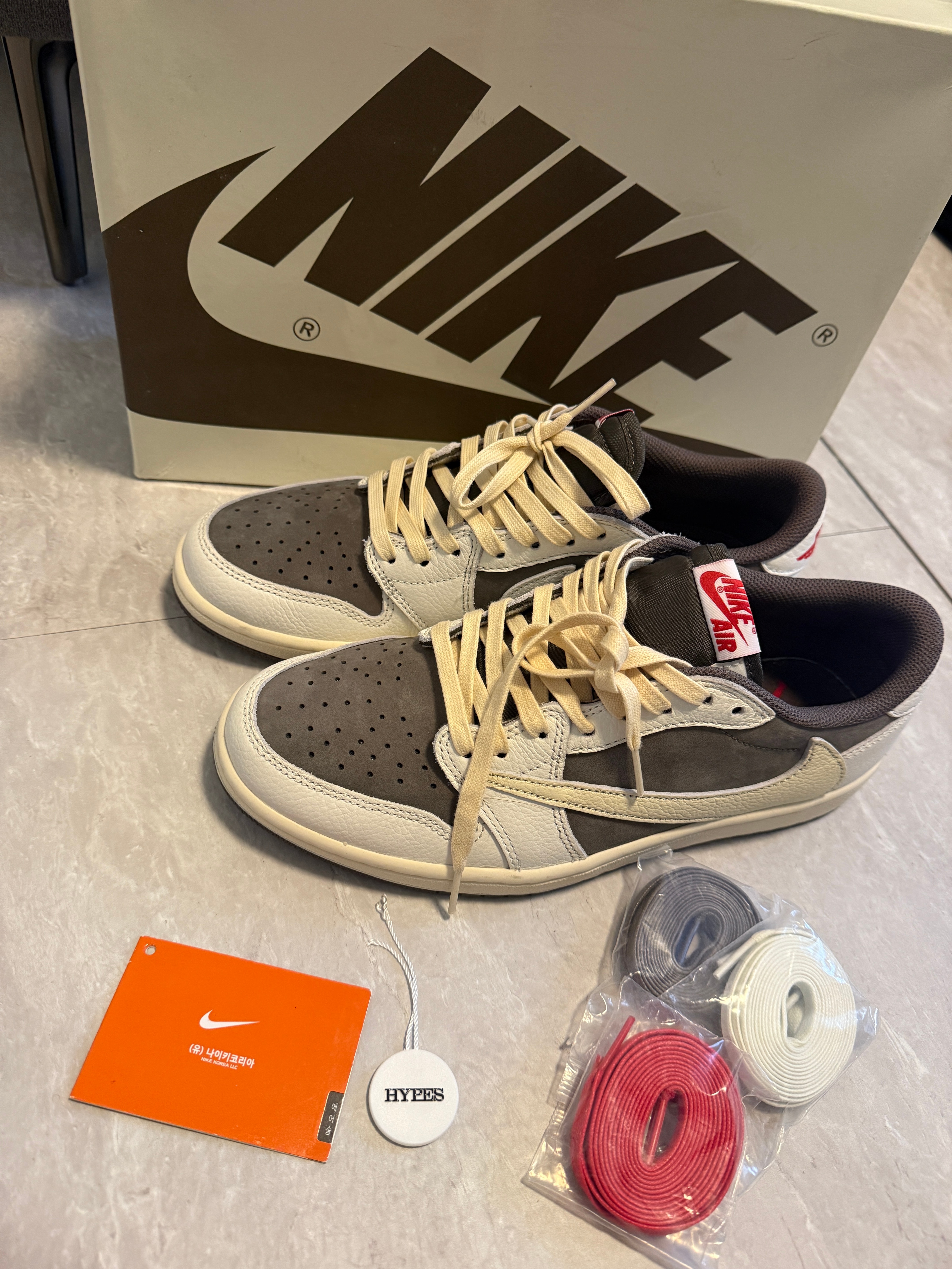 Travis Scott × Nike Air Jordan 1 Low OG SP "Reverse Mocha/Sail and Ridgerock"