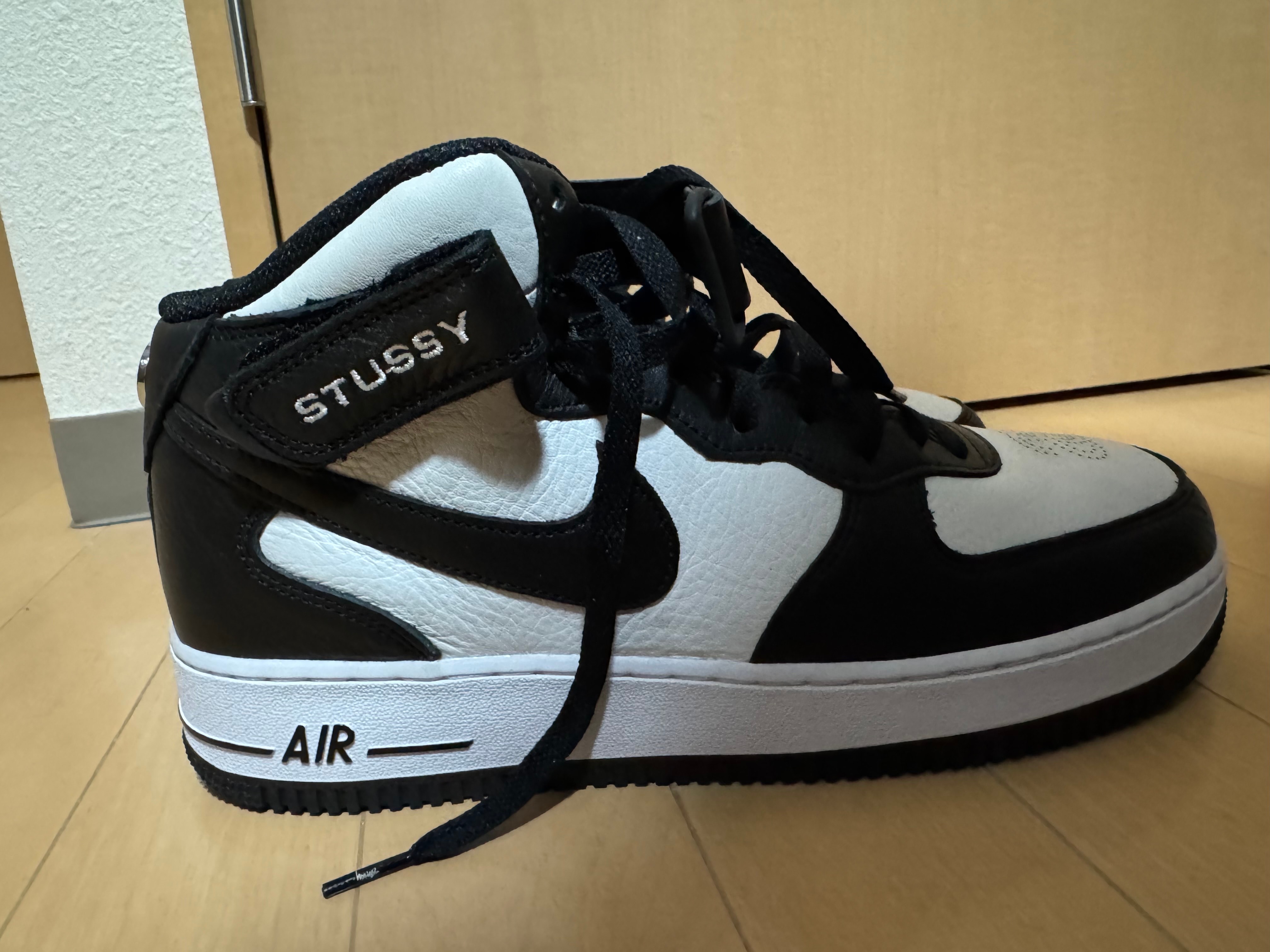 Stussy × Nike Air Force 1 Mid "Black and Light Bone"