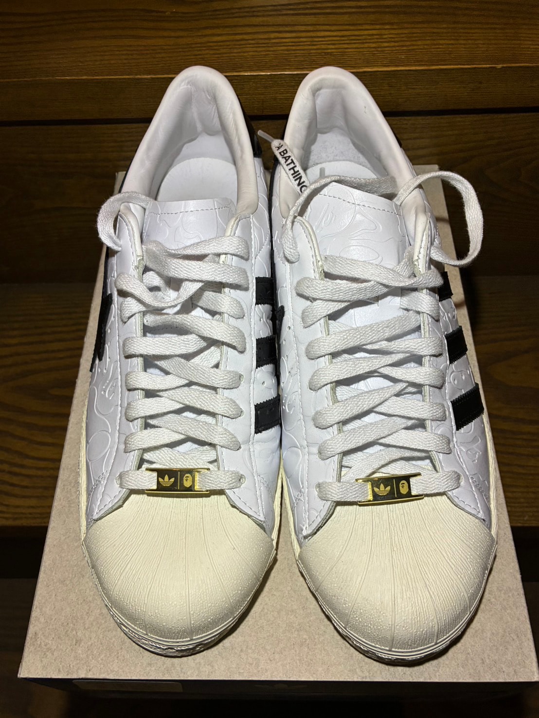A BATHING APE × adidas Superstar V "Footwear White/Core Black/Gold Metallic"