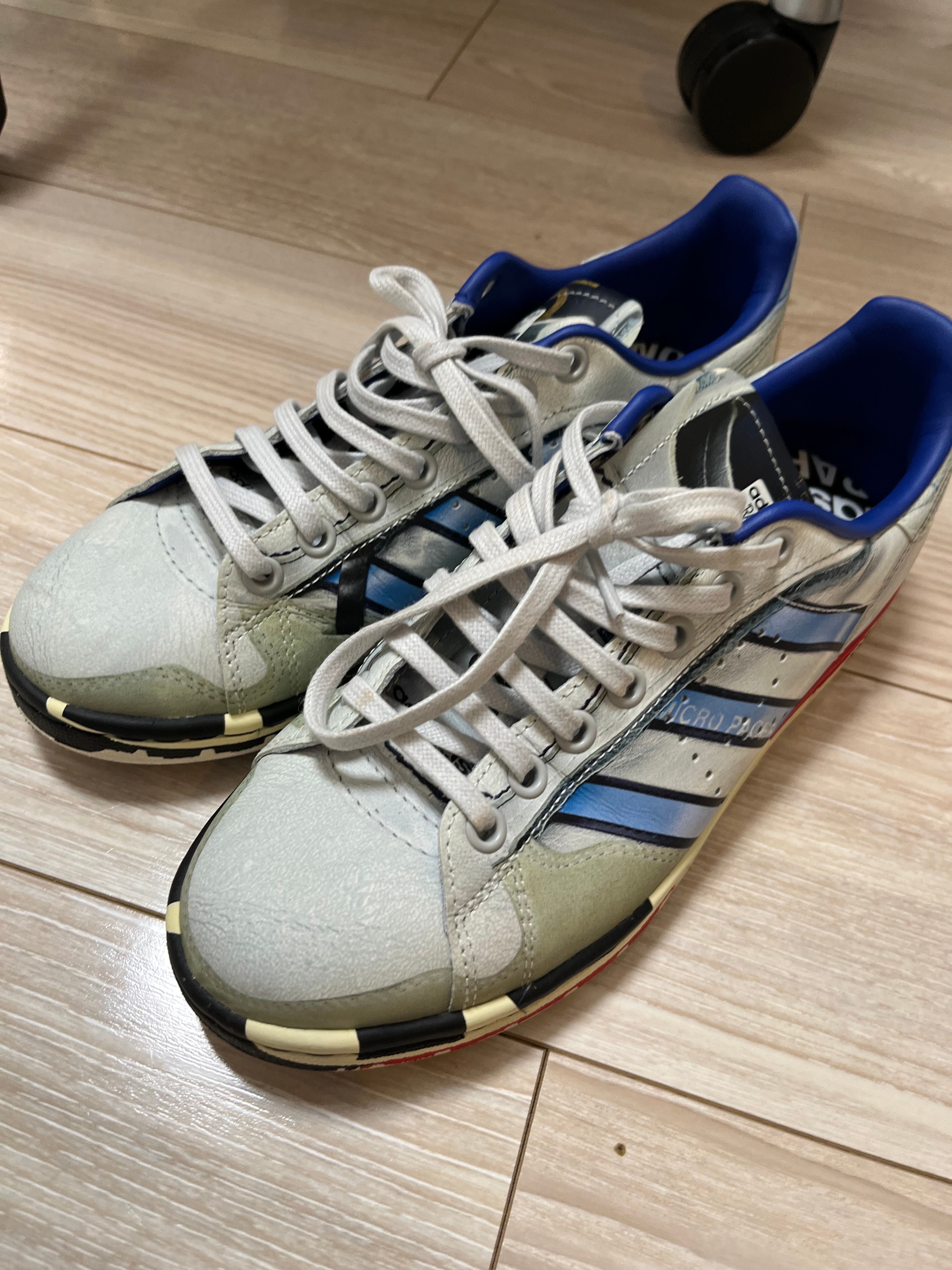 RAF SIMONS × adidas Micropacer Stan Smith "Silver Metallic/Red"