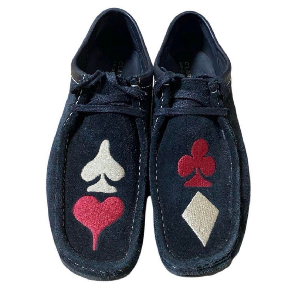 Stussy × Clarks Wallabee "Black Suede/Red/Gold"