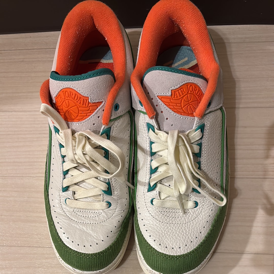 The Titan × Nike Women's Air Jordan 2 Low "Safety Orange/Chlorophyll"