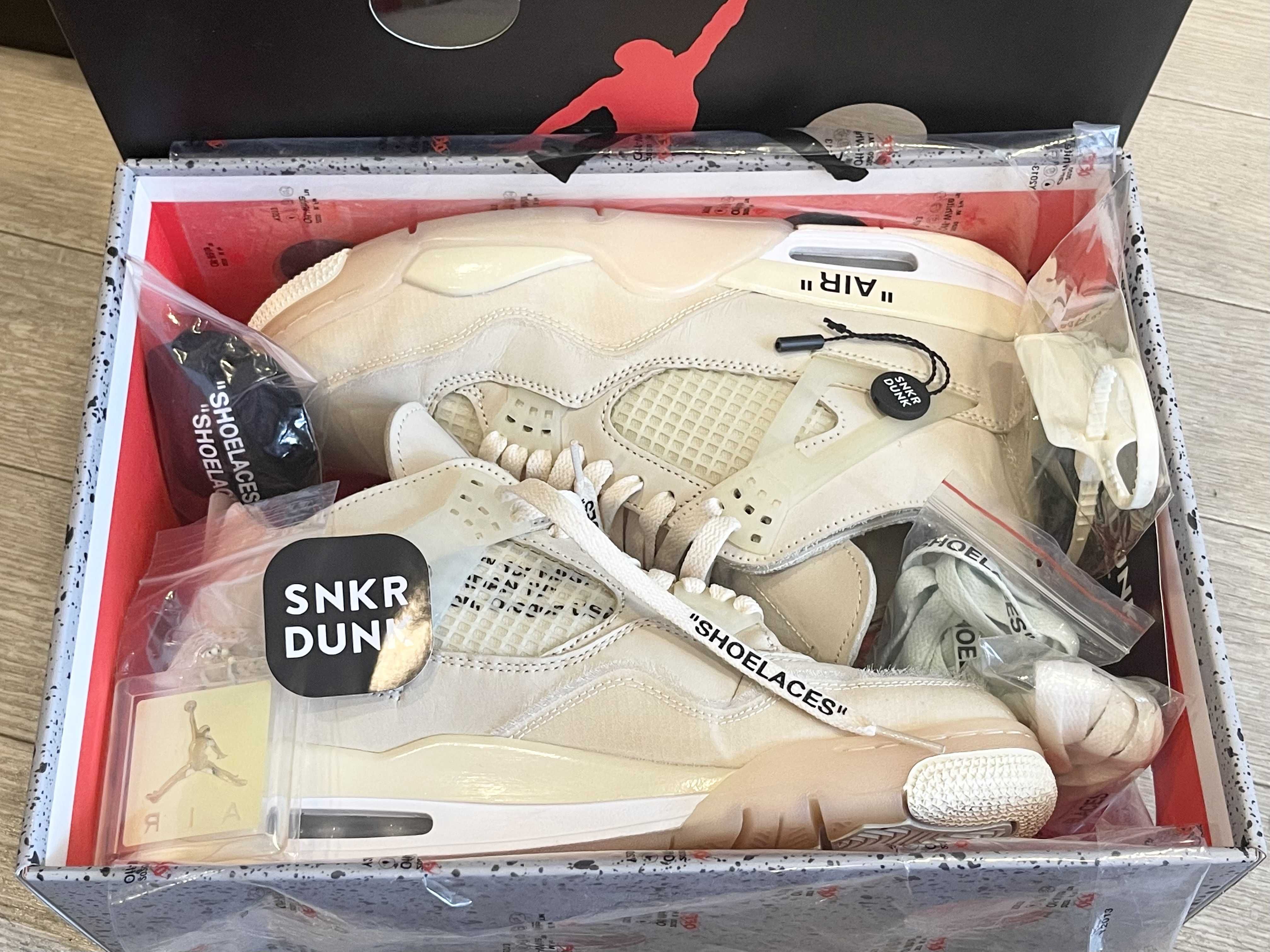 Off-White × Nike Women's Air Jordan 4 SP "Sail"