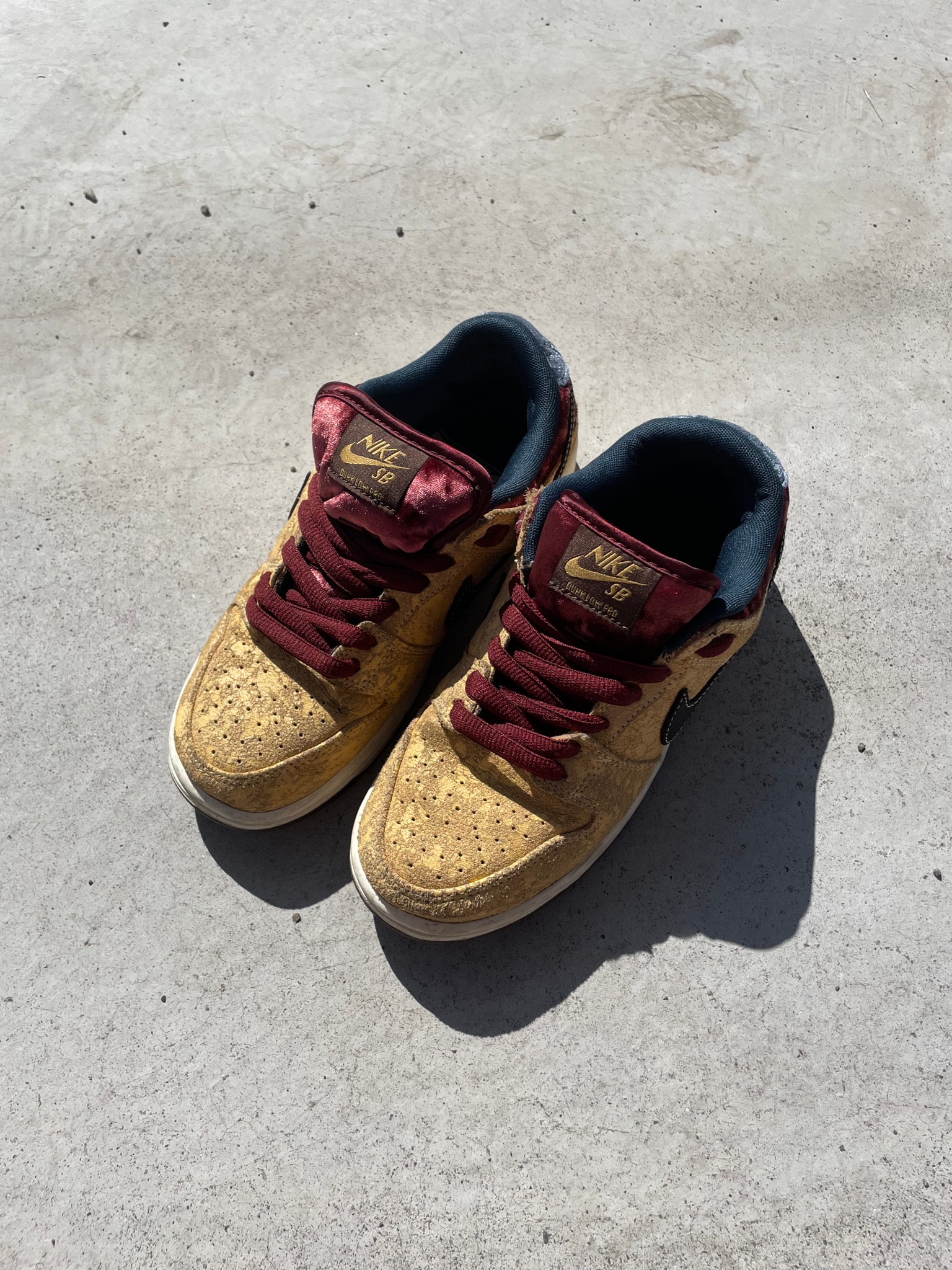Nike SB Dunk Low Pro "City of Cinema/Celestial Gold and Dark Team Red"