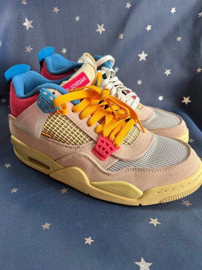 UNION × Nike Air Jordan 4 SP "Guava Ice/Light Fusion Red"