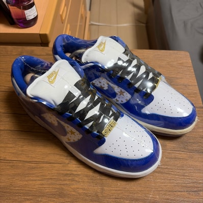 Supreme × Nike SB Dunk Low OG QS Gold Stars "White/Hyper Blue"