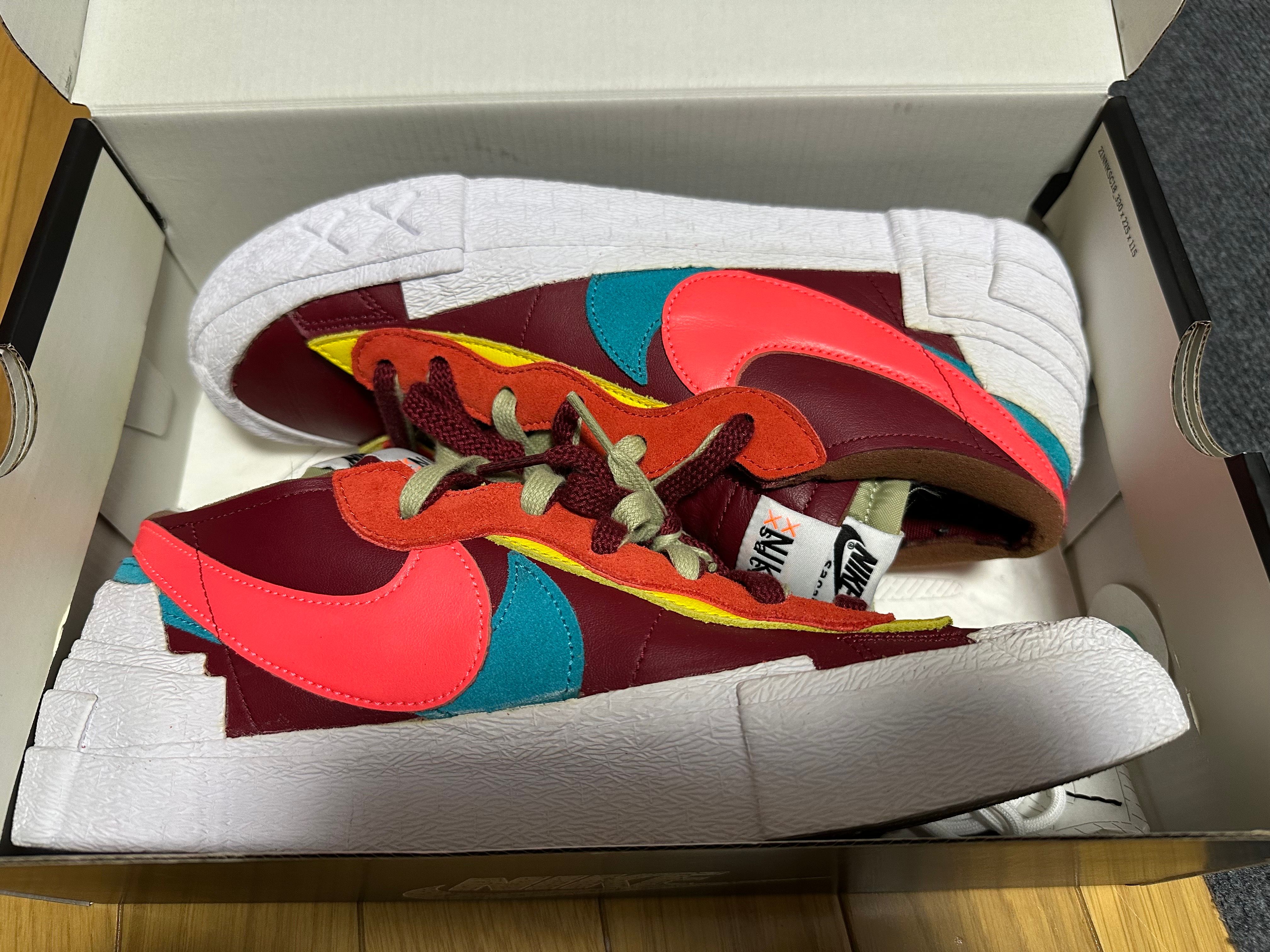 KAWS × sacai × Nike Blazer Low "Team Red"