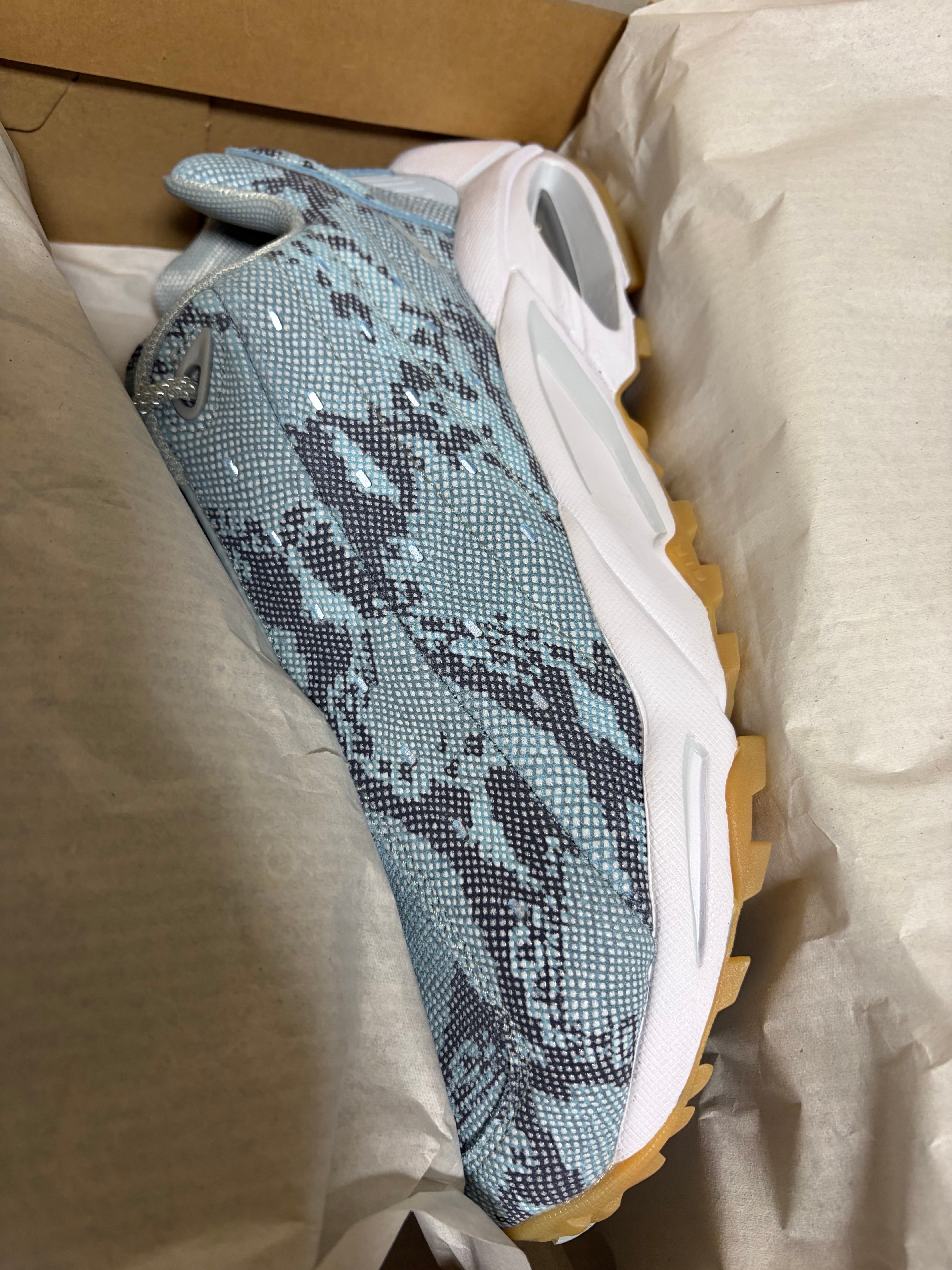 NOCTA × Nike Hot Step Air Terra "Light Bone/Snakeskin"