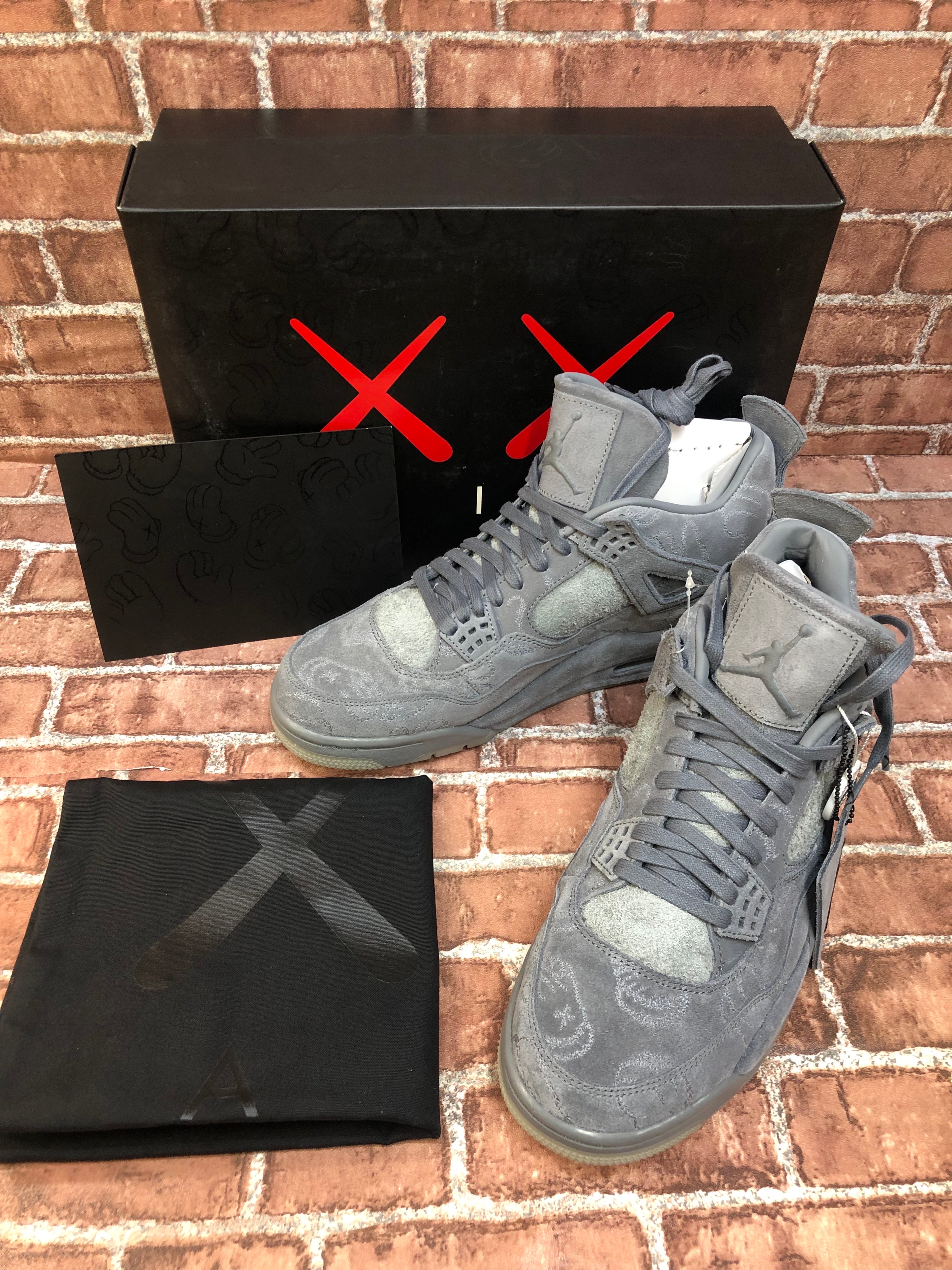 KAWS × Nike Air Jordan 4 Retro "Grey"