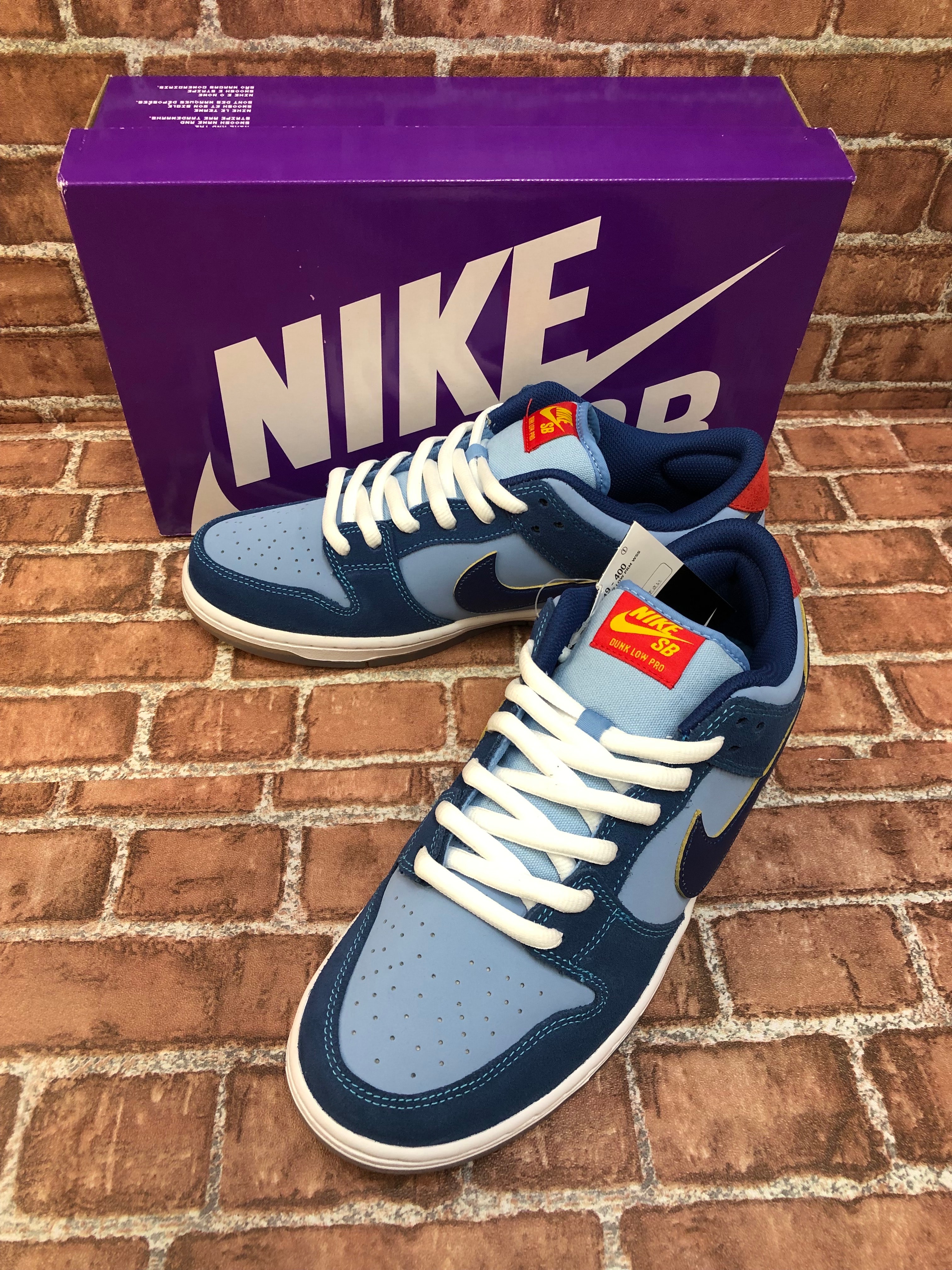 Why So Sad? × Nike SB Dunk Low "Coastal Blue/Speed Yellow-University Red"