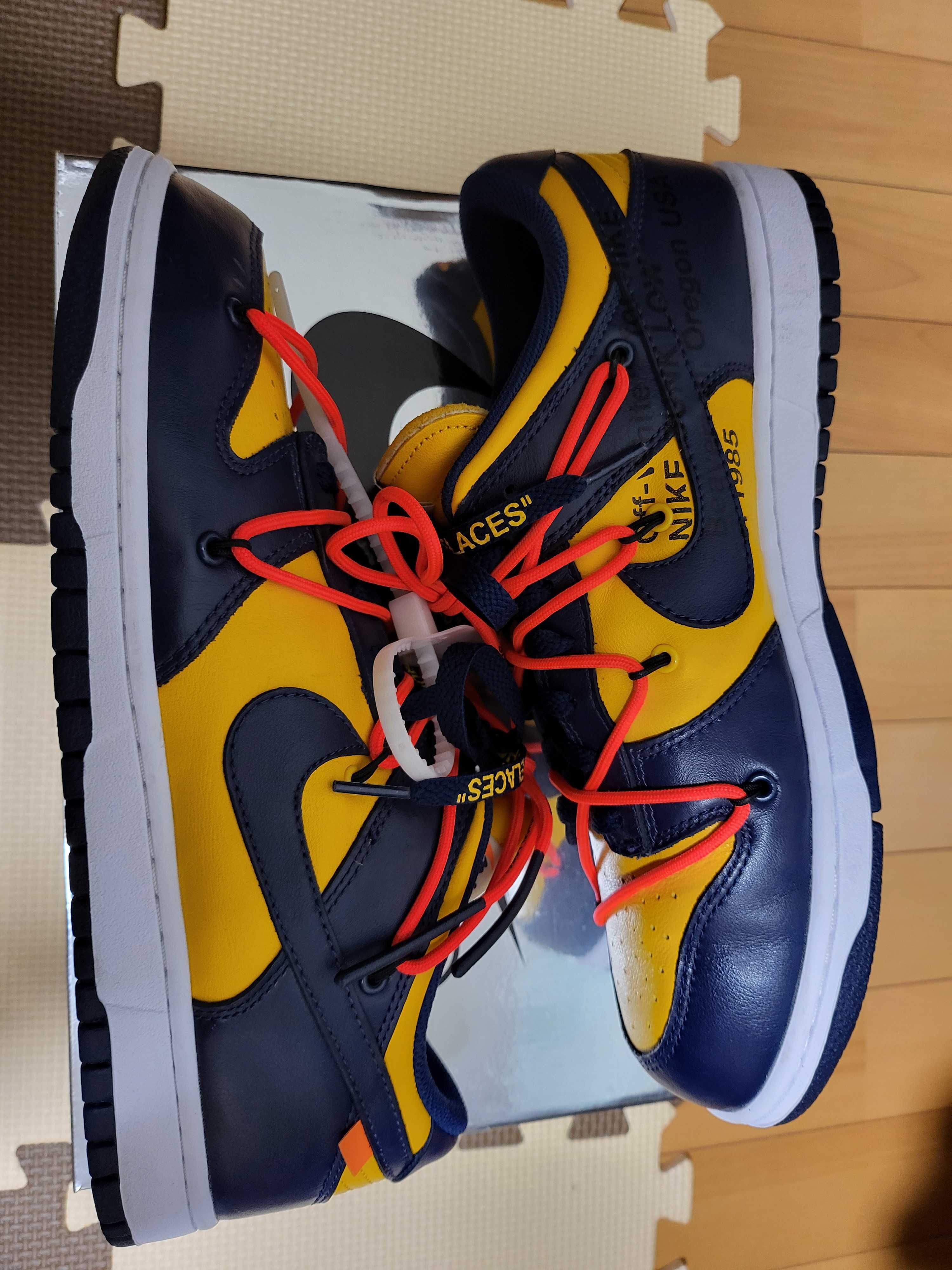 Off-White × Nike Dunk Low LTHR "University Gold/Midnight Navy/White"