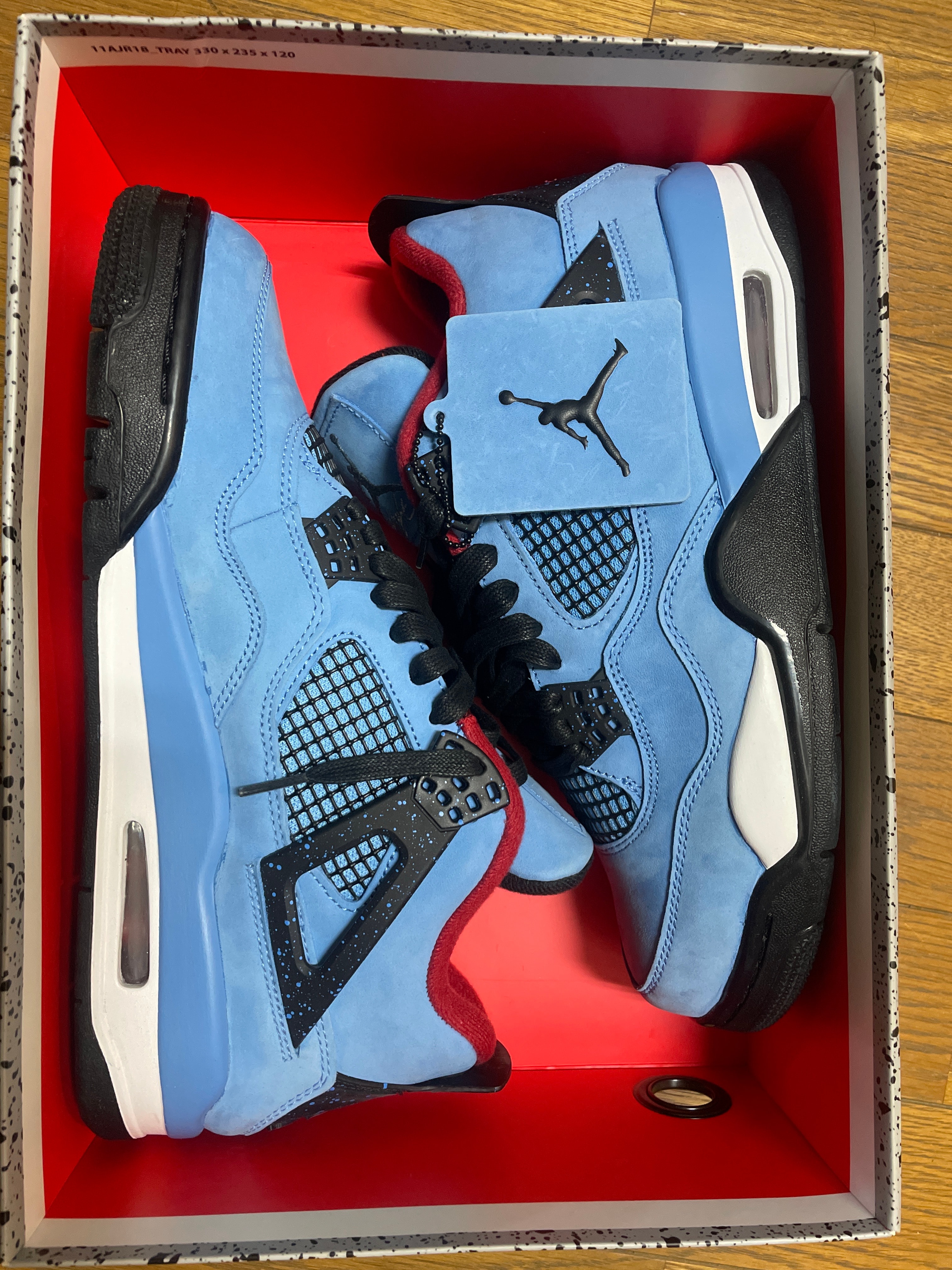 Travis Scott × Nike Air Jordan 4 Retro Cactus Jack "University Blue"