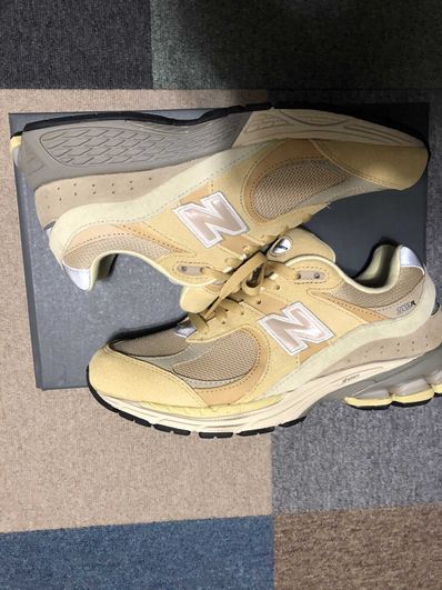 AURALEE × New Balance 2002R "Yellow/Beige"