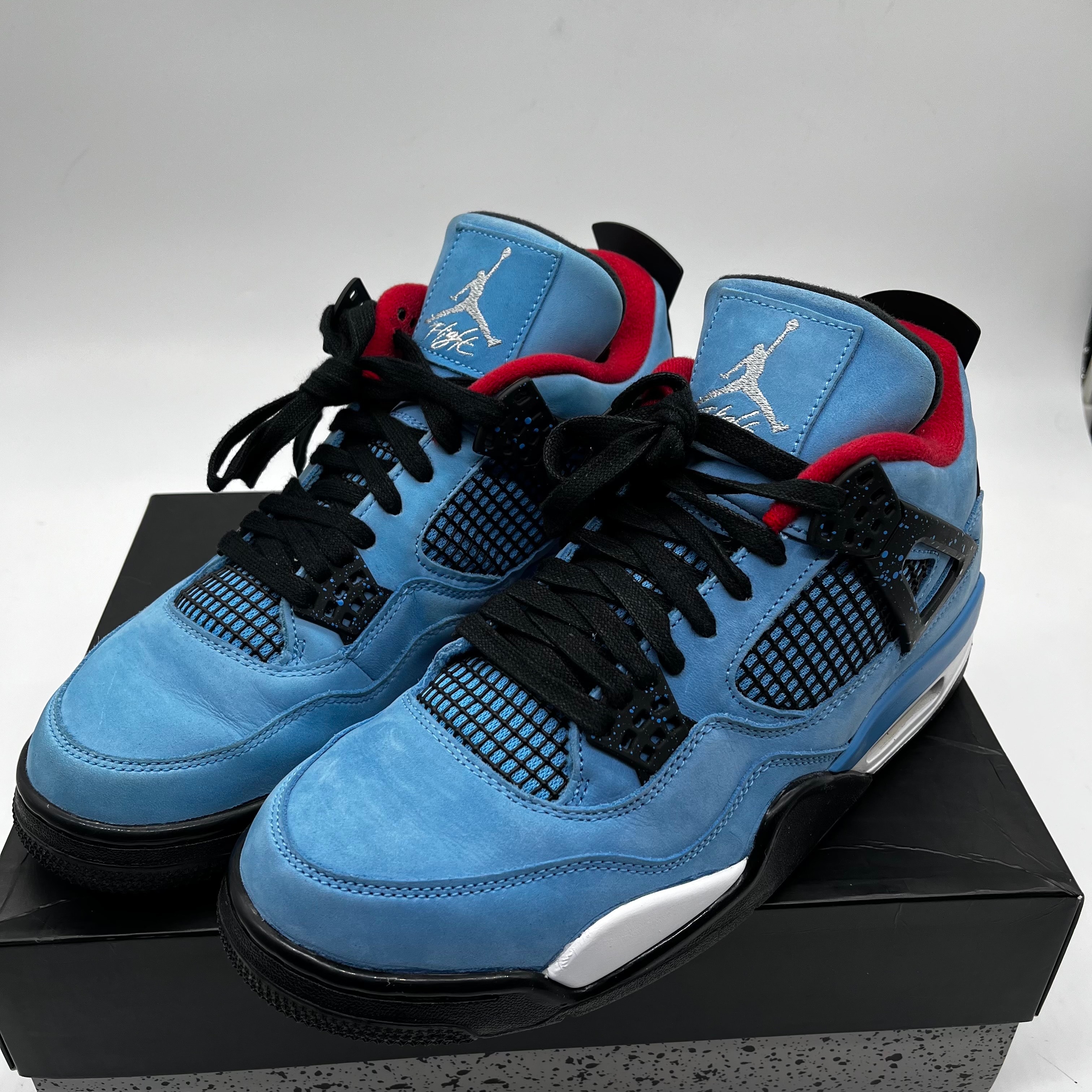 Travis Scott × Nike Air Jordan 4 Retro Cactus Jack "University Blue"