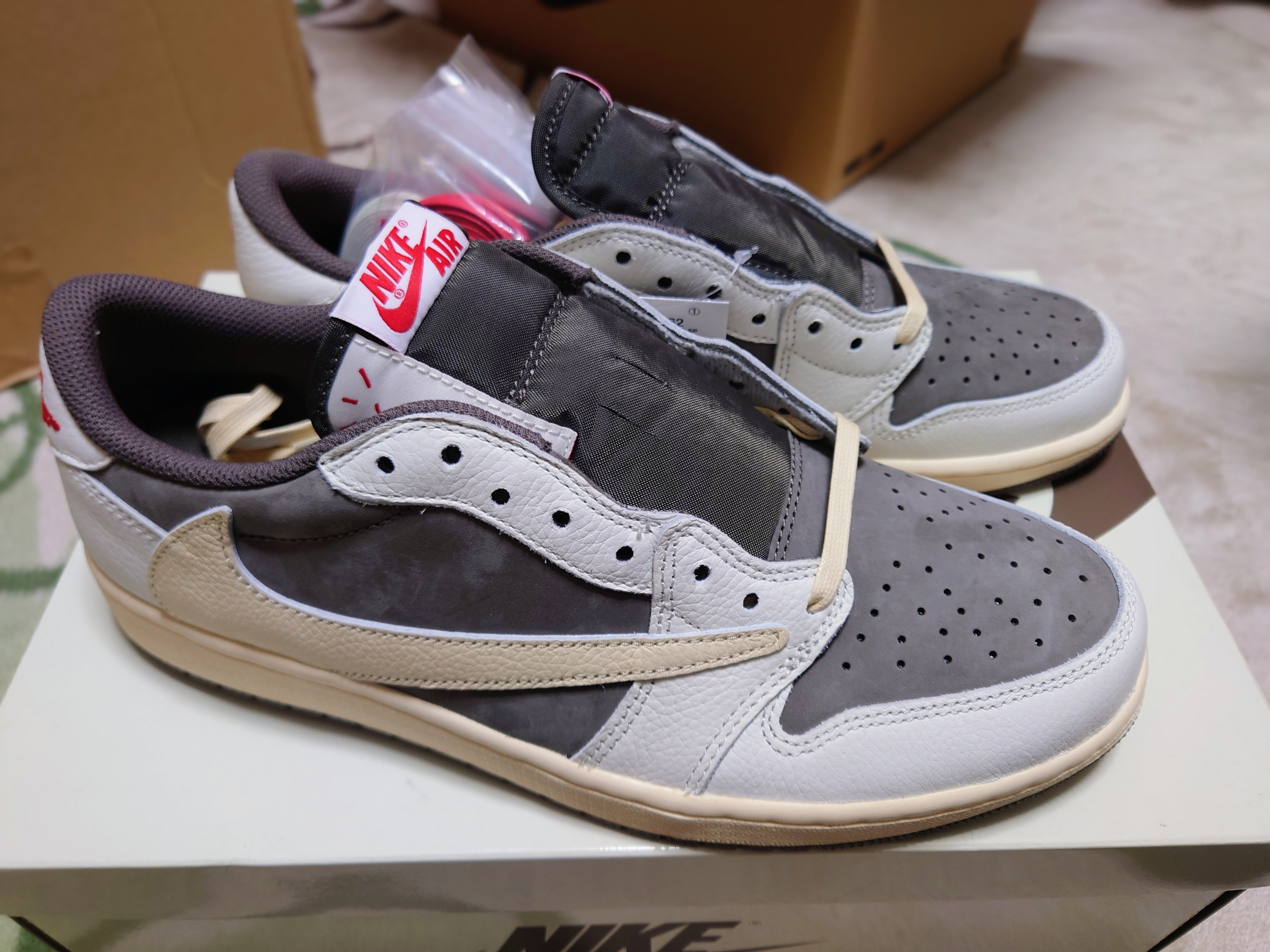 Travis Scott × Nike Air Jordan 1 Low OG SP "Reverse Mocha/Sail and Ridgerock"