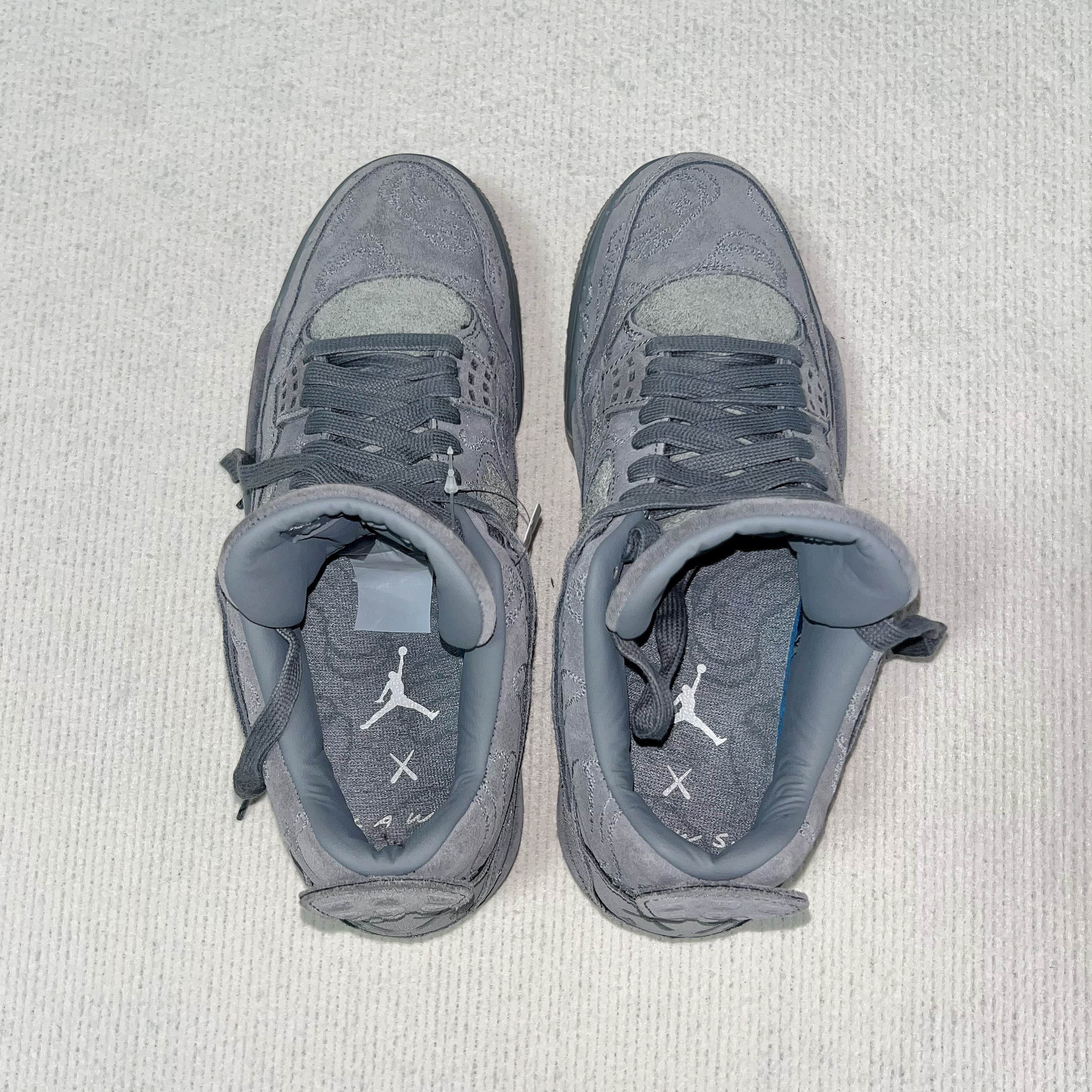 KAWS × Nike Air Jordan 4 Retro "Grey"